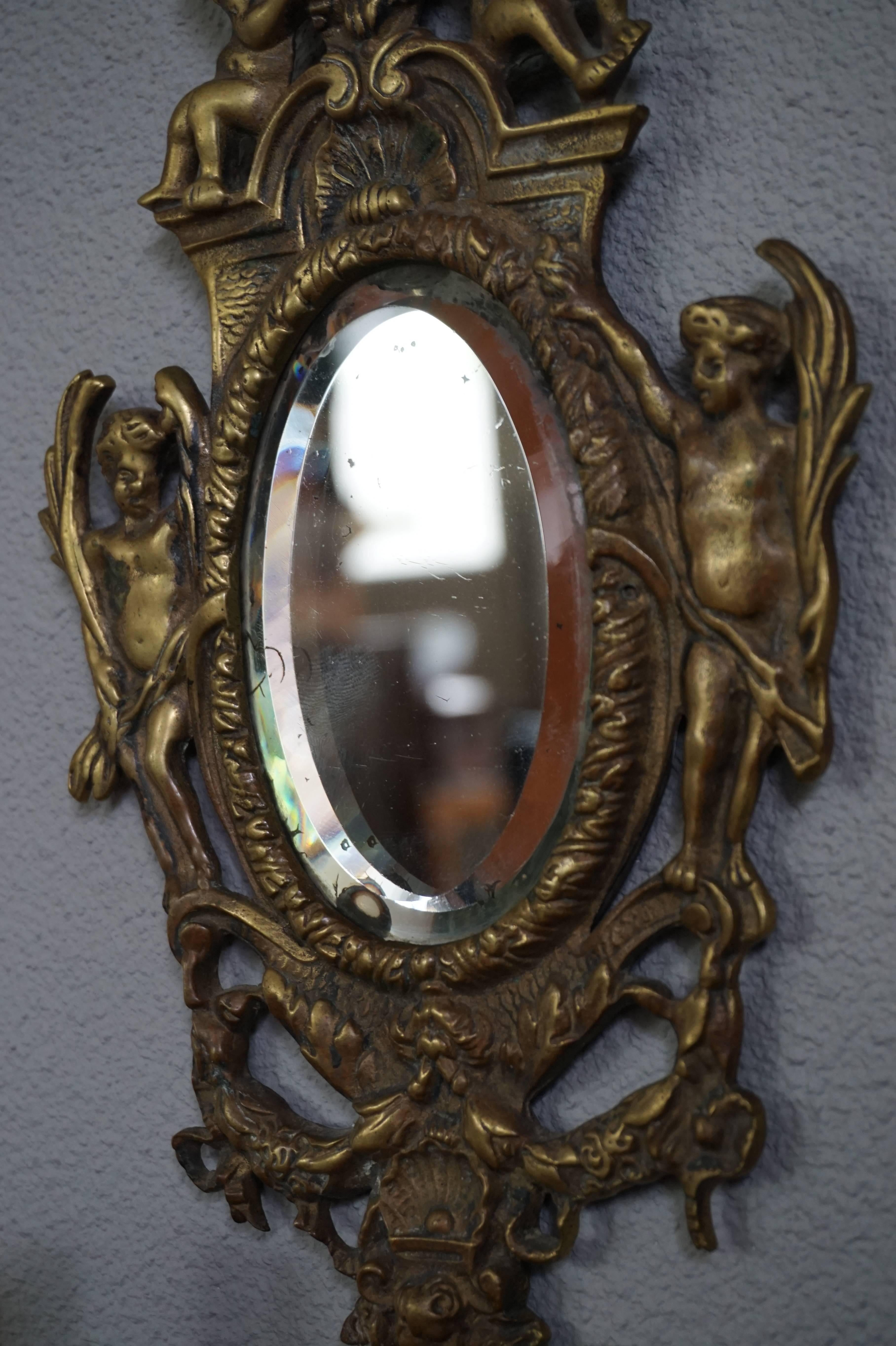 Antique Pair of Cast Bronze Wall Sconces / Candelabras with Oval Beveled Mirrors In Excellent Condition In Lisse, NL