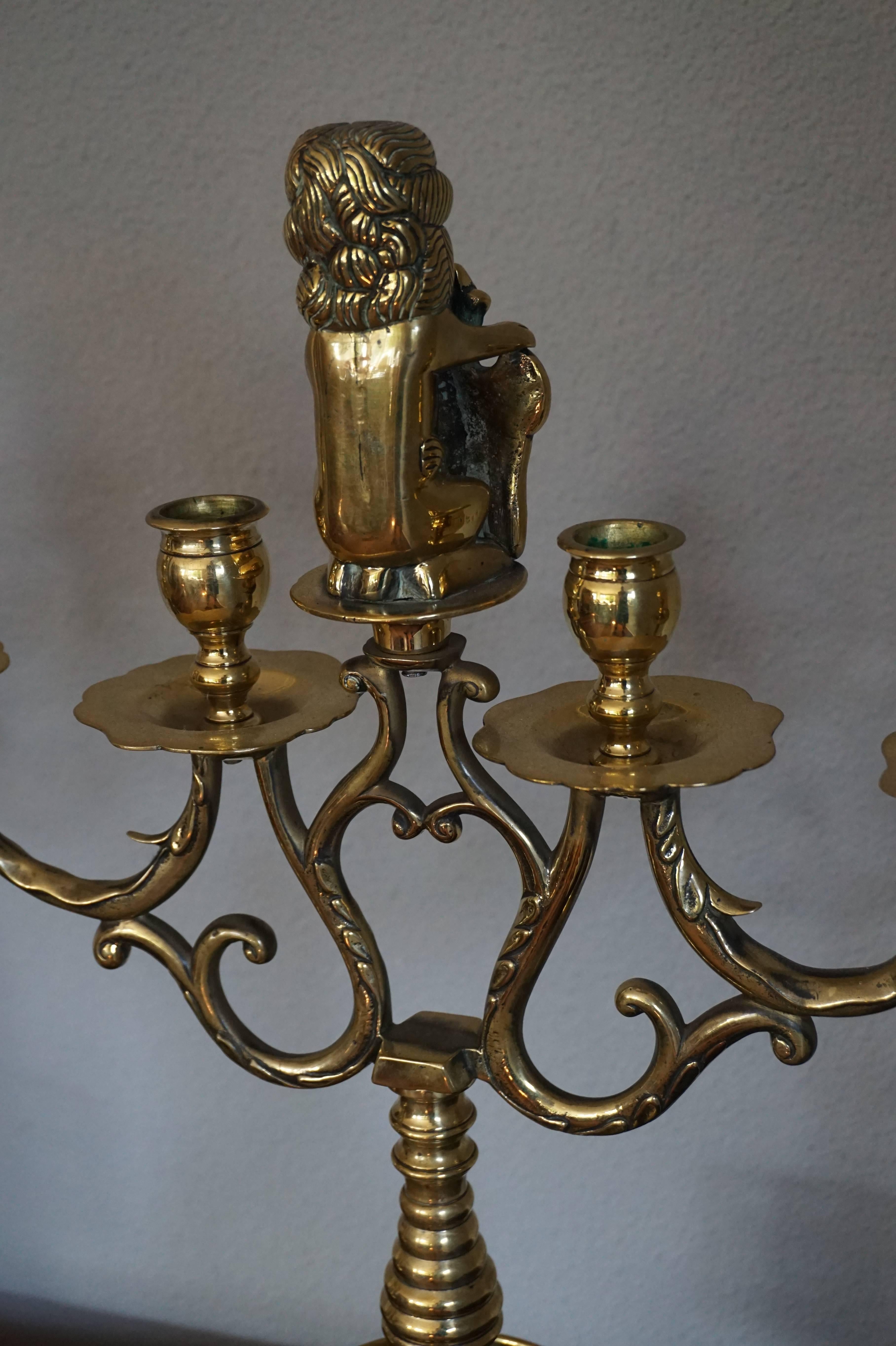 Large Pair of Brass Candelabras with Lions Holding the Coat of Arms of Amsterdam In Excellent Condition For Sale In Lisse, NL