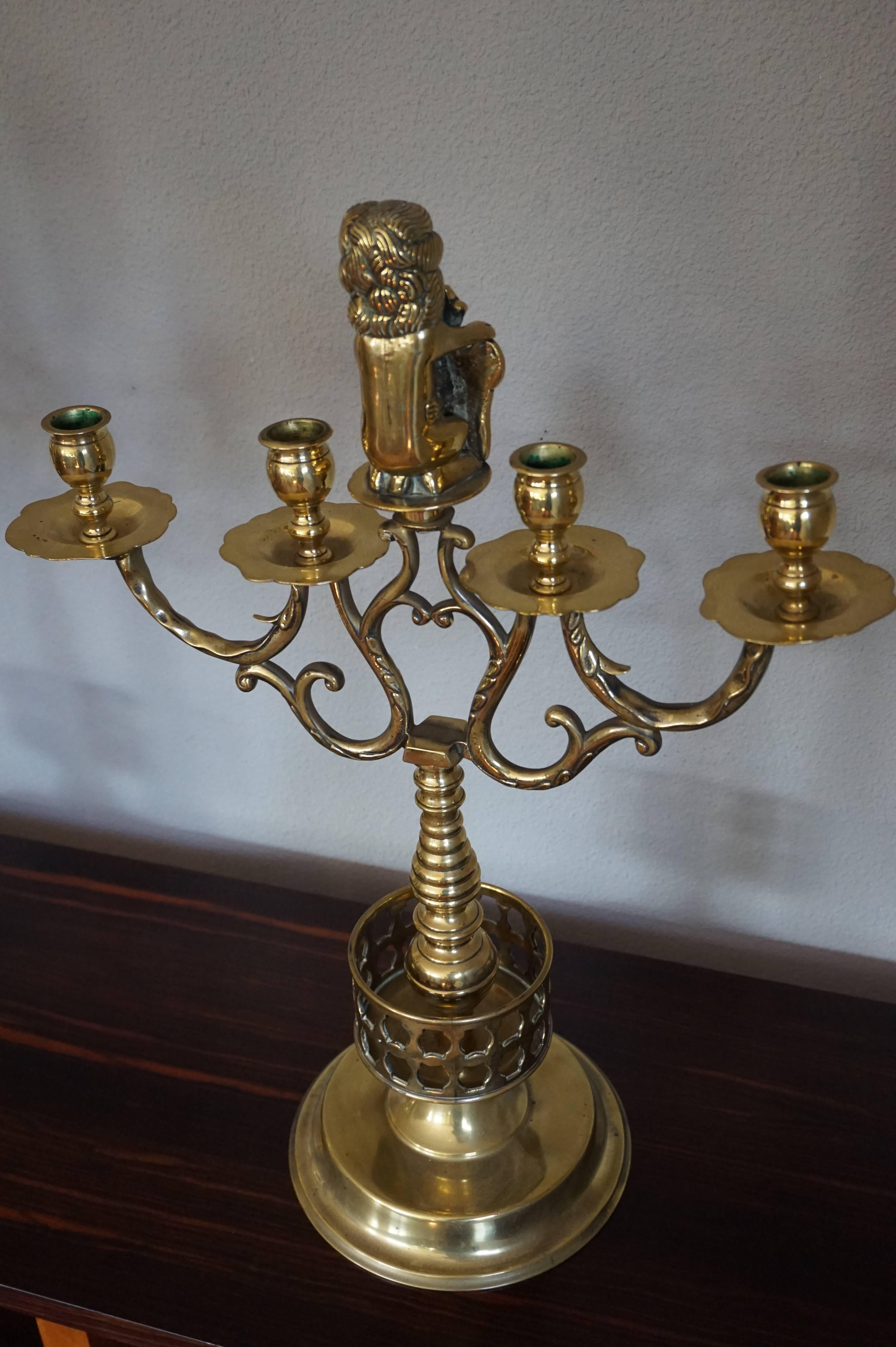 20th Century Large Pair of Brass Candelabras with Lions Holding the Coat of Arms of Amsterdam For Sale