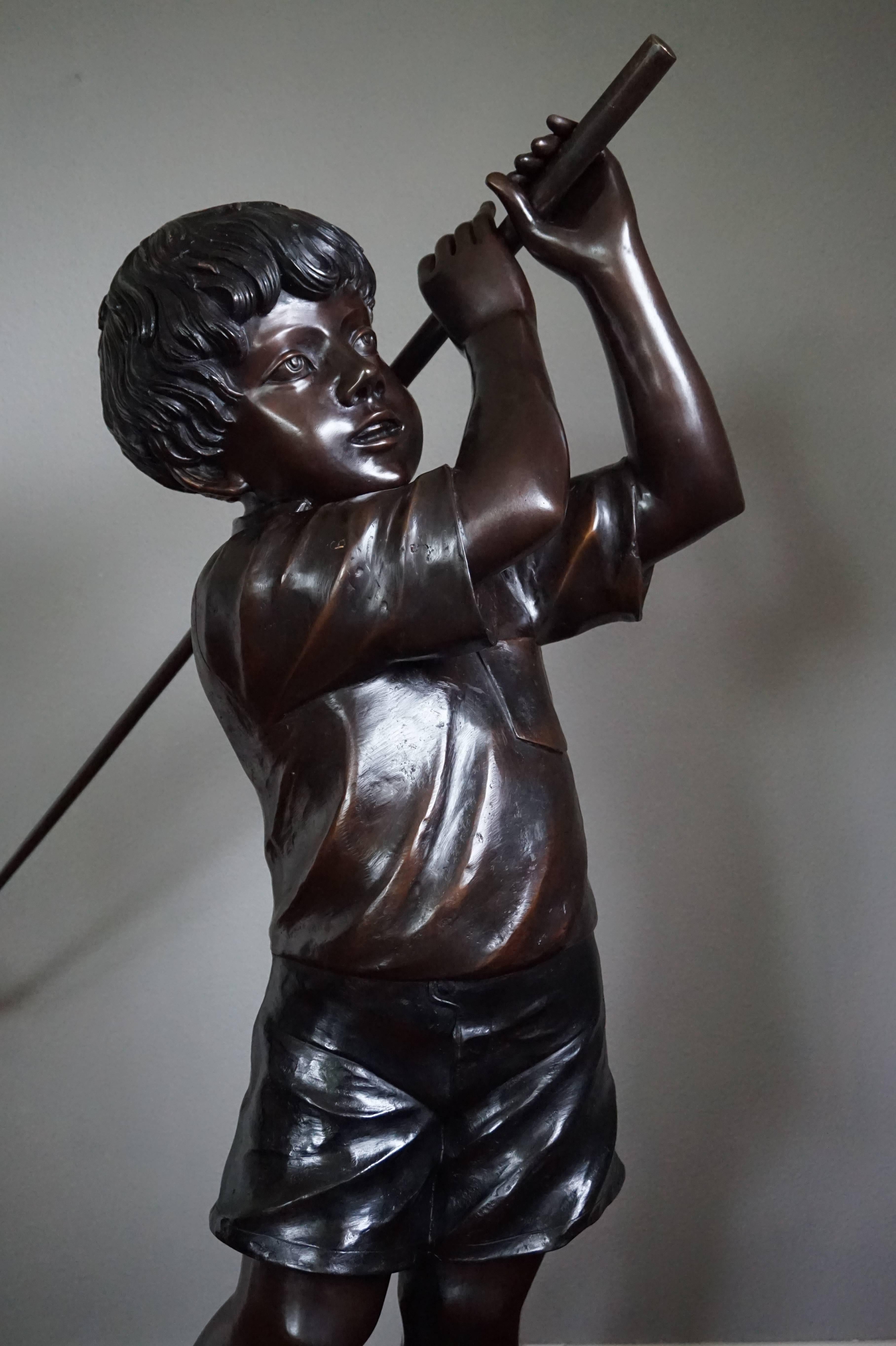Arts and Crafts Life-Size and Signed Bronze Sculpture of Golf Playing Boy in His Father's Shoes