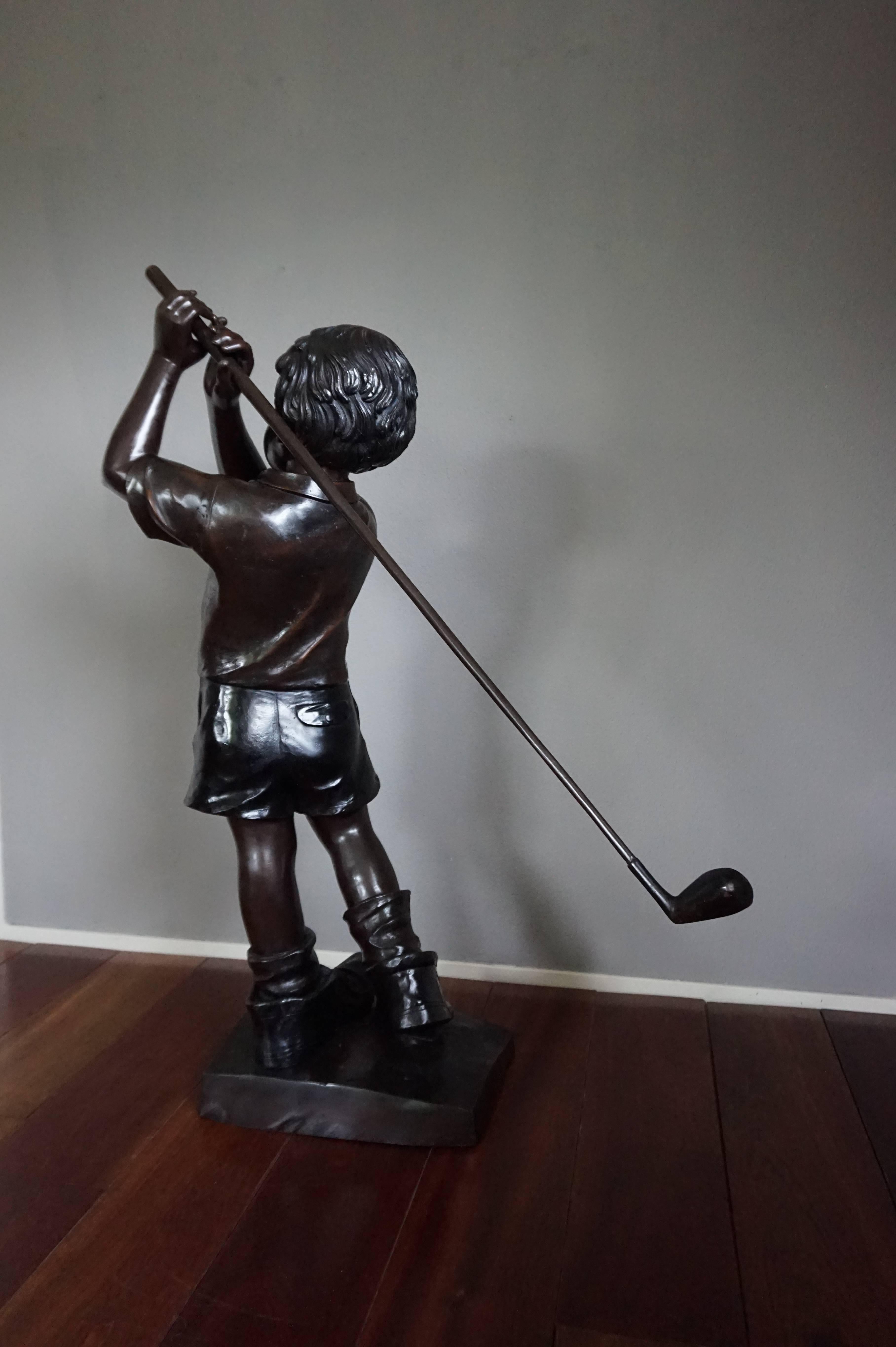 European Life-Size and Signed Bronze Sculpture of Golf Playing Boy in His Father's Shoes