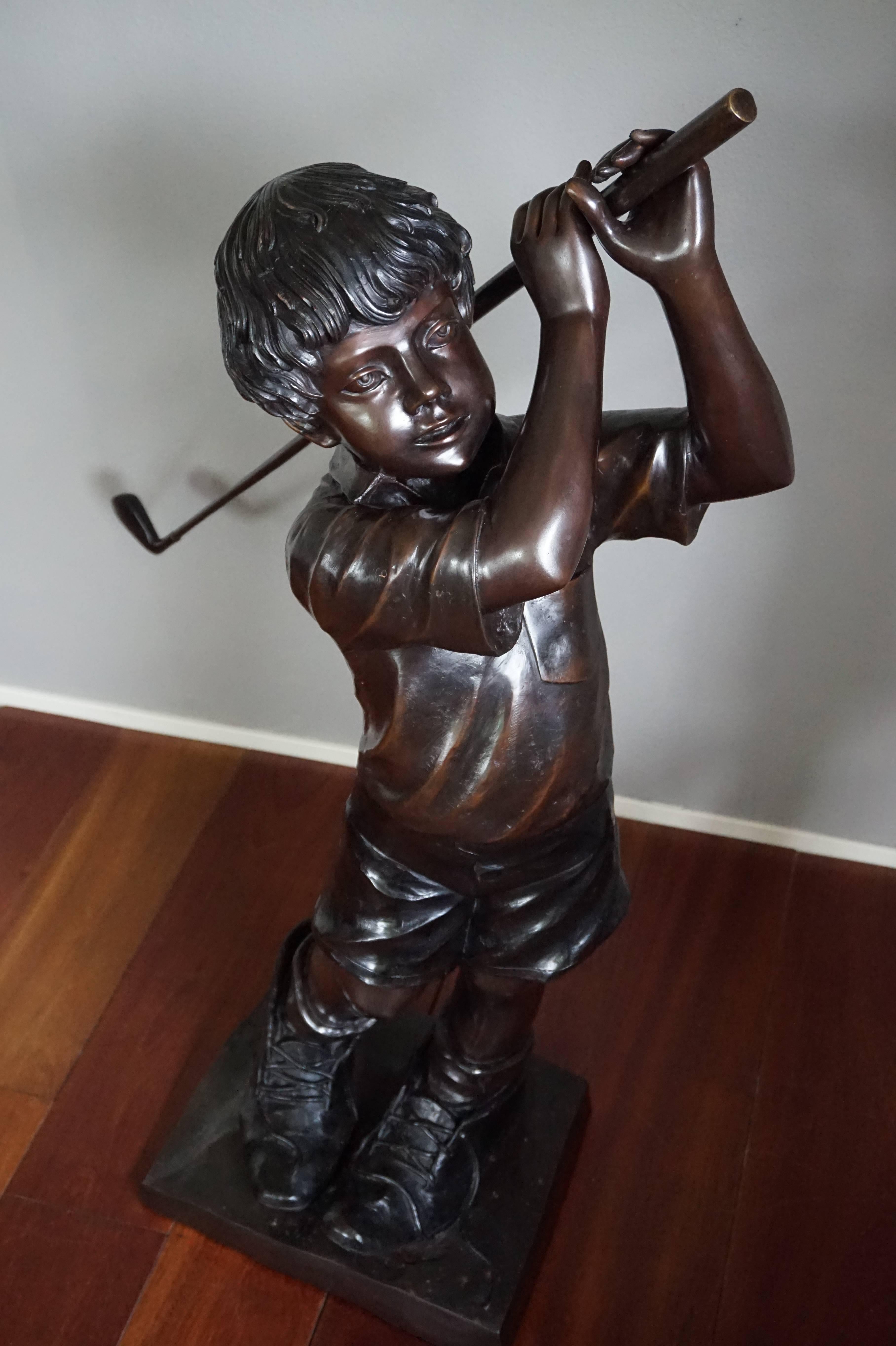 20th Century Life-Size and Signed Bronze Sculpture of Golf Playing Boy in His Father's Shoes