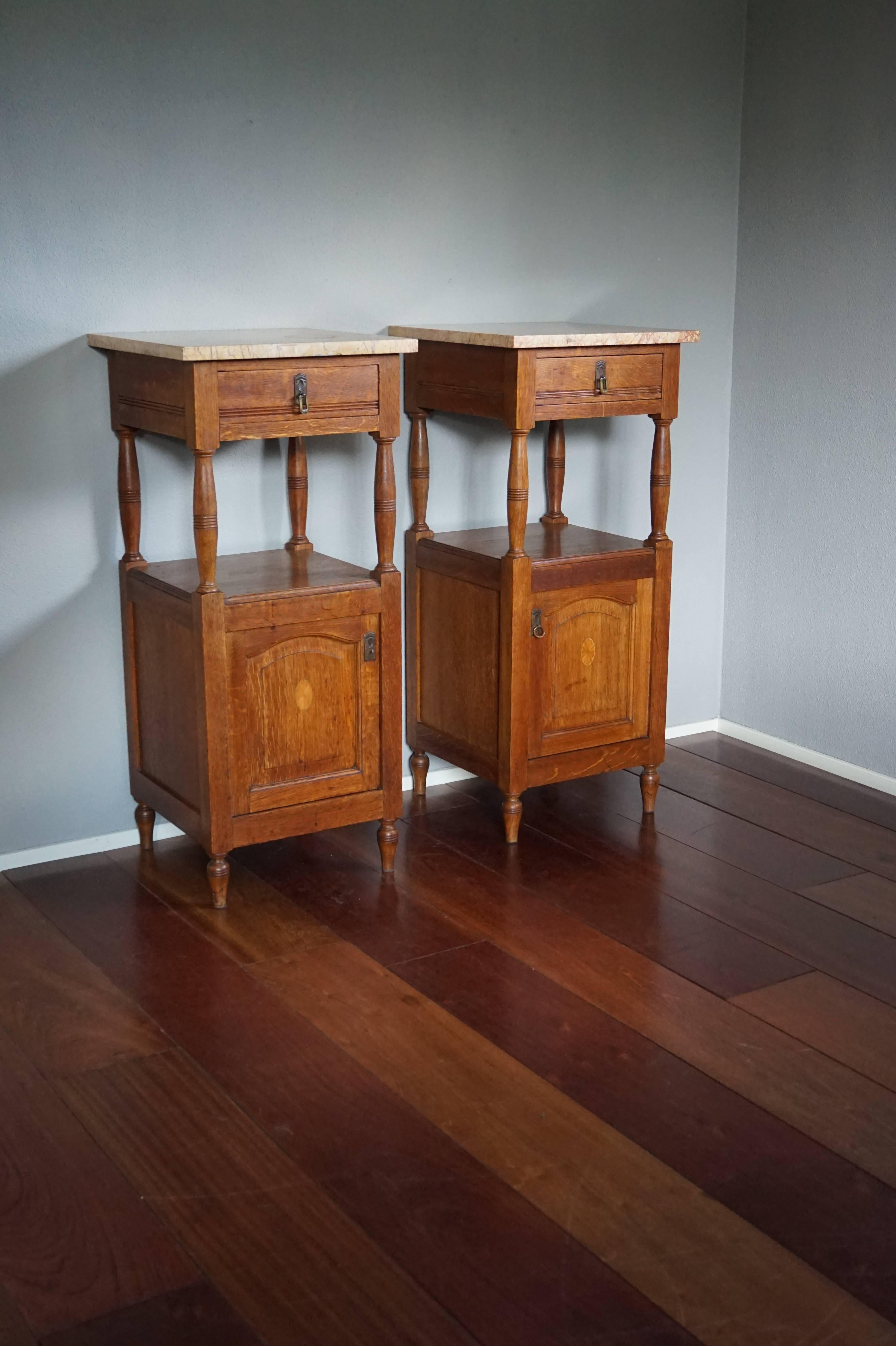 Beautiful antique nightstands with inlaid oval rosettes and more.

These tall and hand-crafted antique nightstands were made to stand on either side of a bed, but we have also sold nightstands to galleries who use them to display vases, bronze