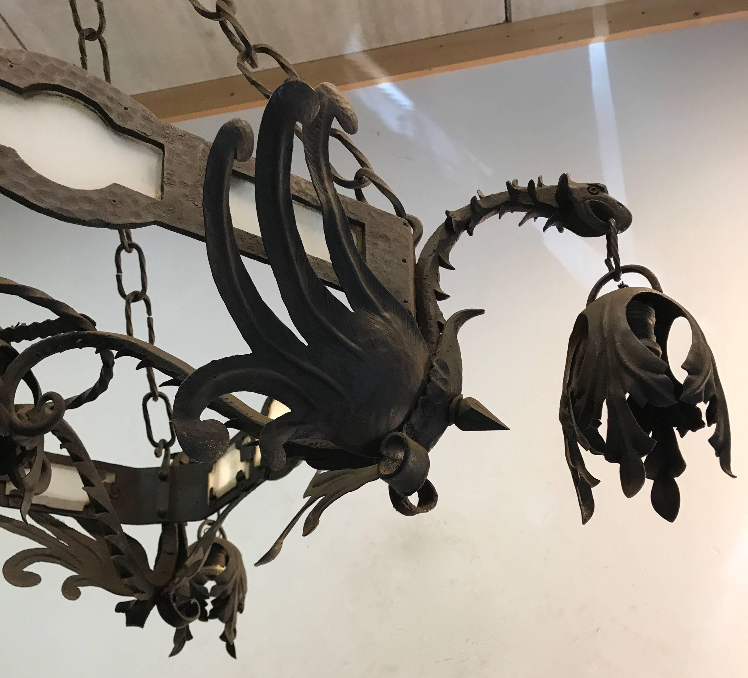 Unique Hand Forged Wrought Iron Chandelier with Four Winged Griffin Sculptures In Excellent Condition For Sale In Lisse, NL