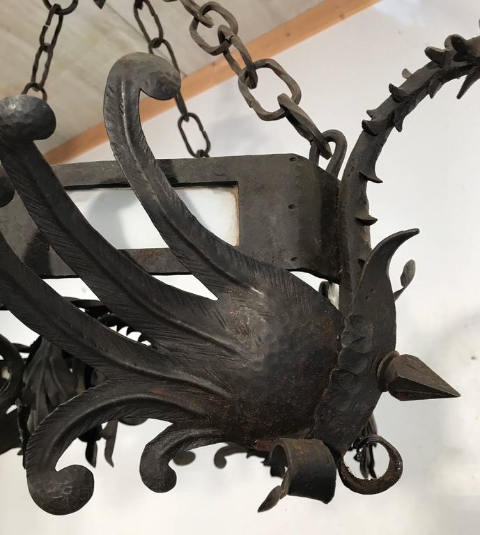 Unique Hand Wrought Iron Chandelier with Four Winged Griffin