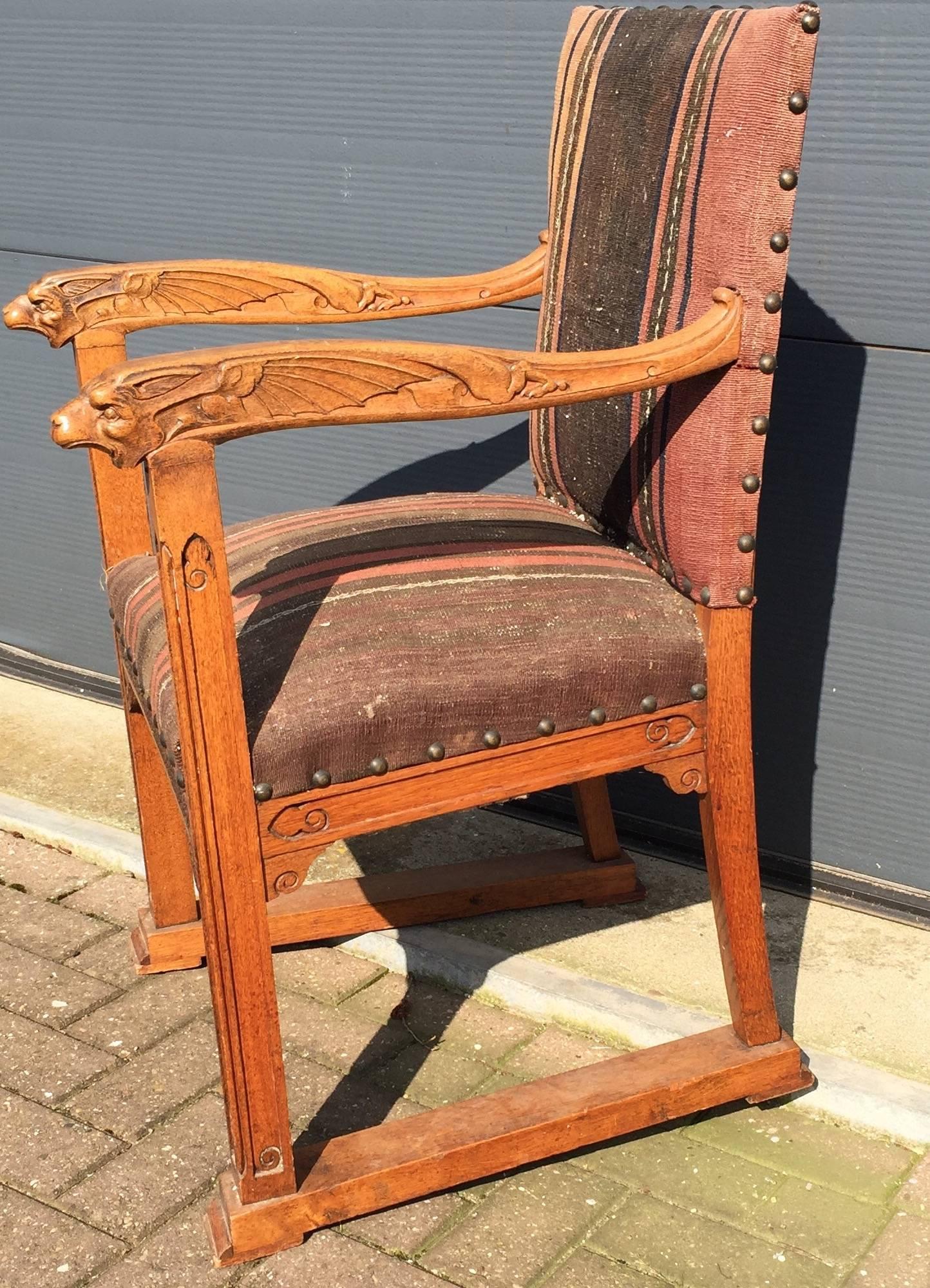 Unique and impressive Gothic chair from the late 1800s. 

This rare Gothic Revival church chair is as stabile as the day it was made and the woodwork is in good to excellent condition. The solid oak frame comes with various and good quality carved,
