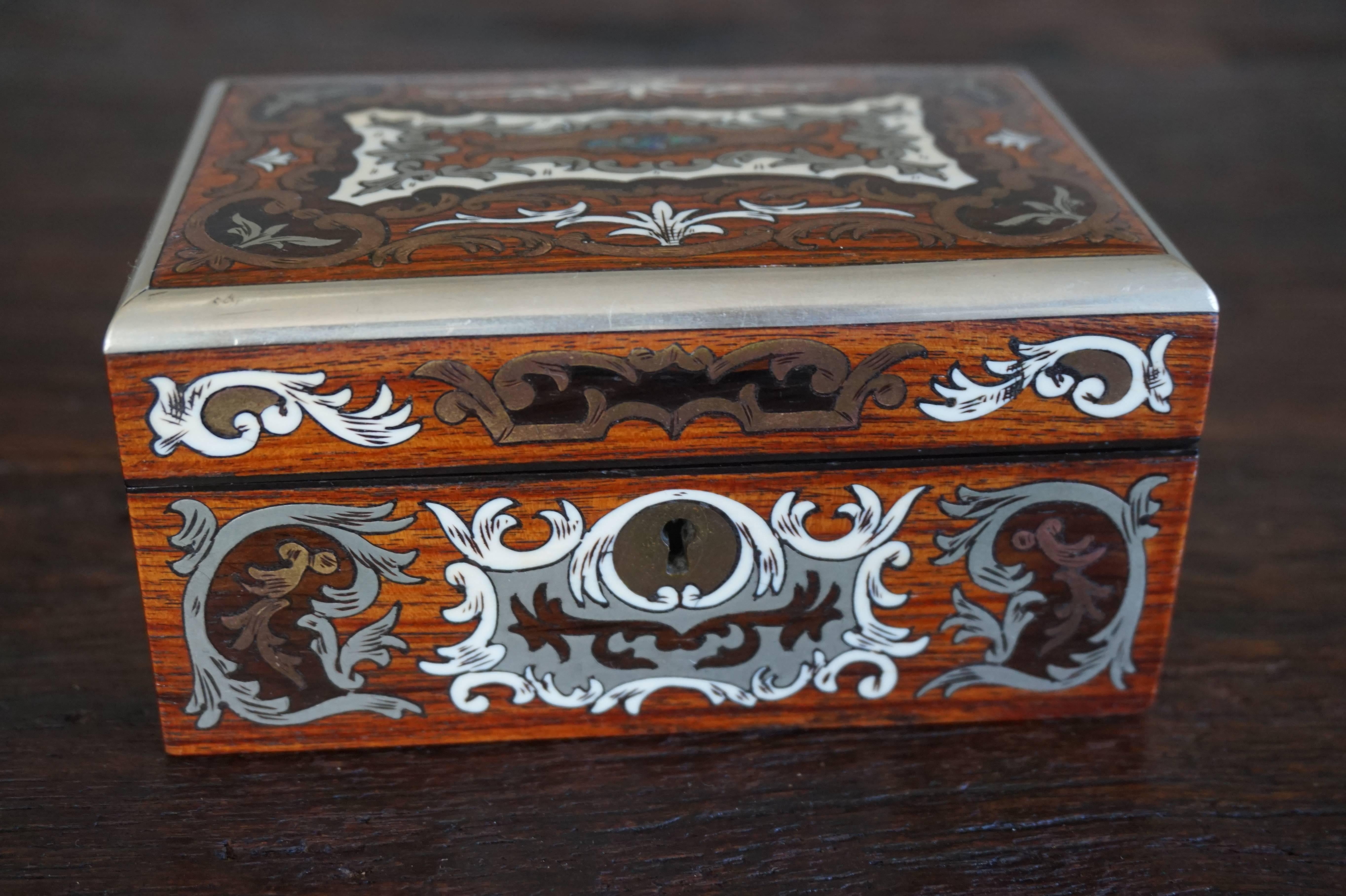 Amazing craftsmanship from the early 1900s.

This handcrafted and one of a kind antique box is a real jaw dropper. This finest of boxes would only be affordable for the wealthiest in society. The materials used and the amount of time it would have