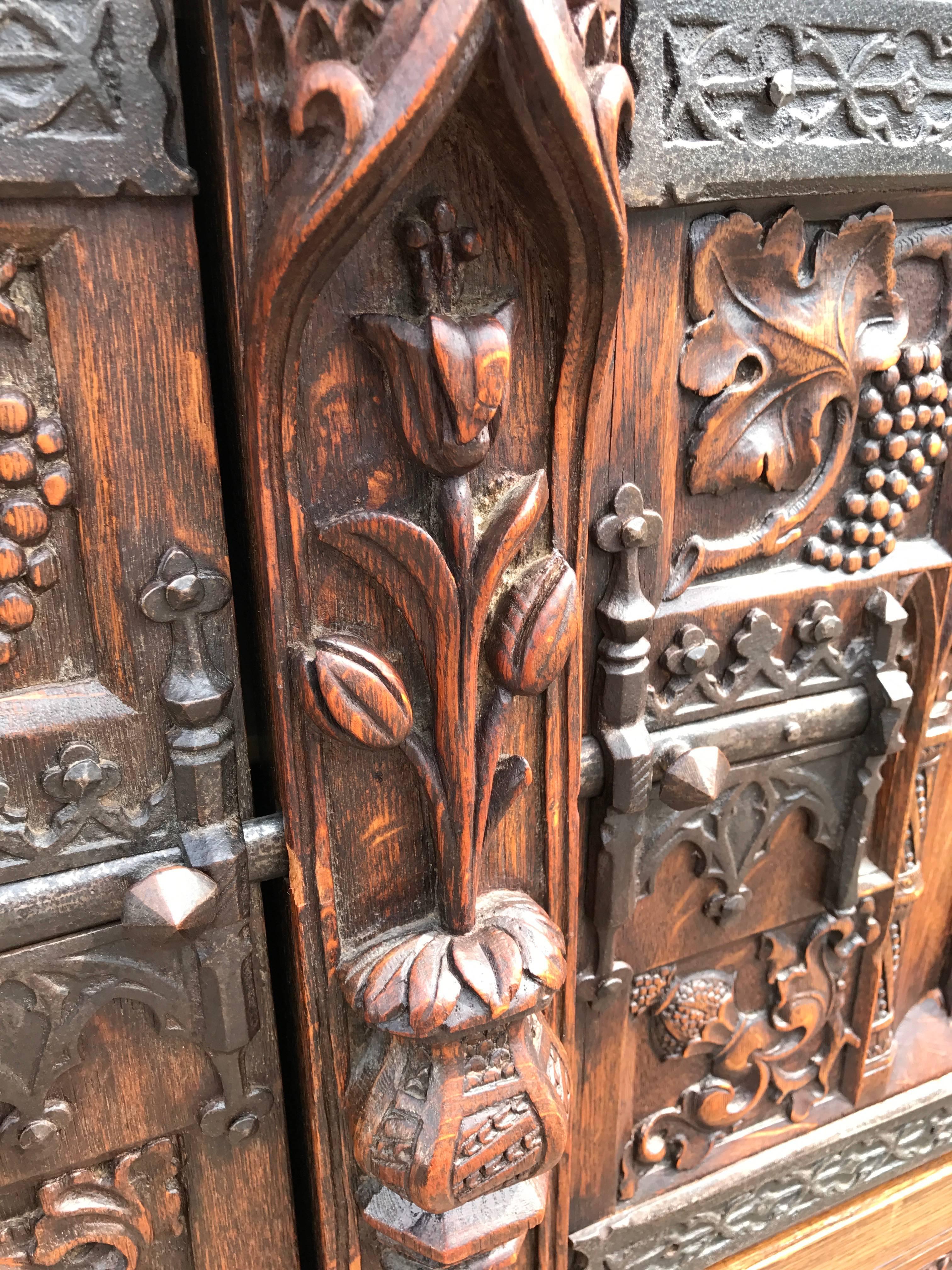 20th Century Gothic Revival Carved Oak Cabinet Depicting The Annunciation To The Virgin Mary