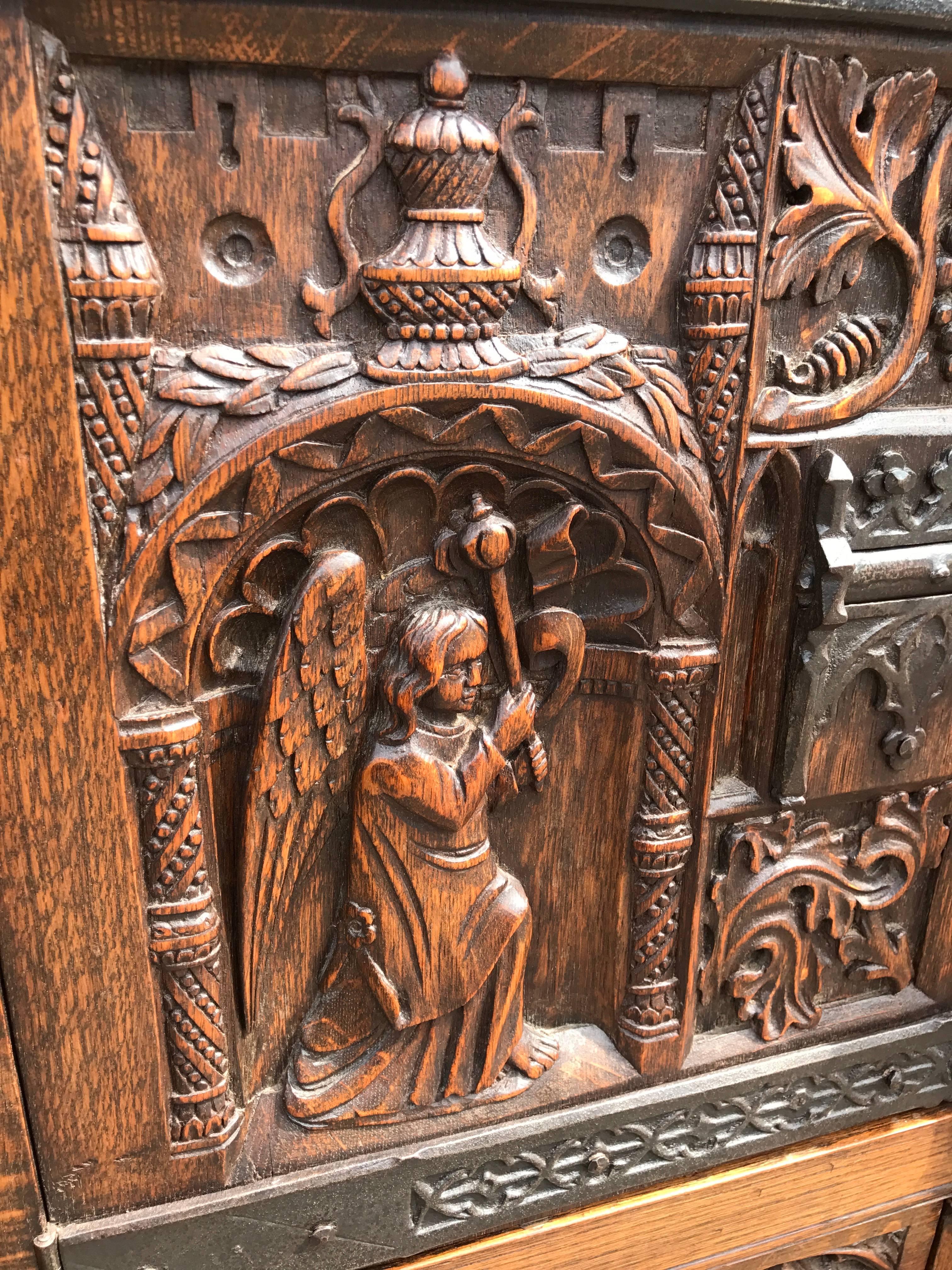 Gothic Revival Carved Oak Cabinet Depicting The Annunciation To The Virgin Mary 1