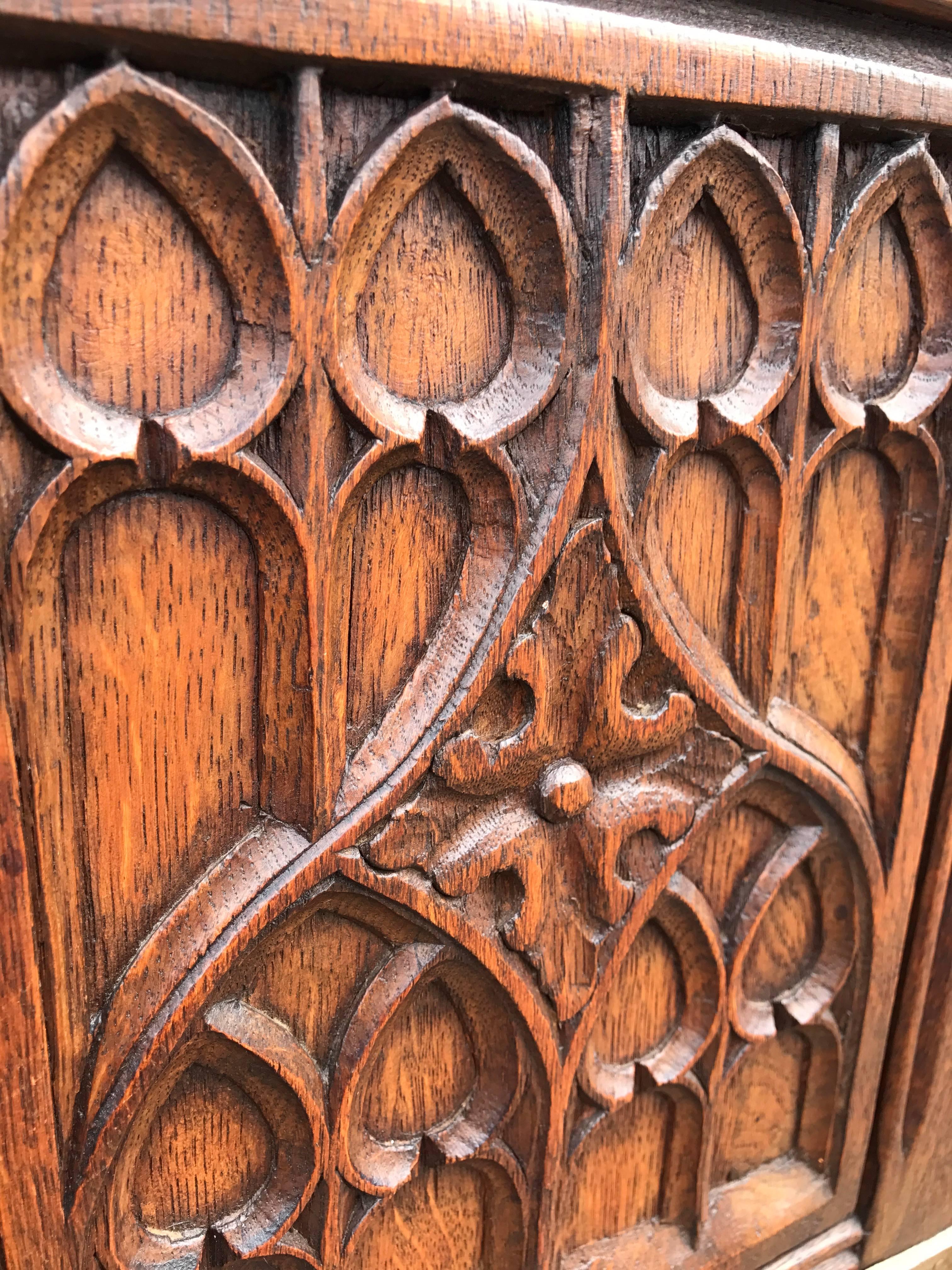European Mid-20th Century Hand-Carved Gothic Revival Drinks Cabinet with Cast Iron Hinges