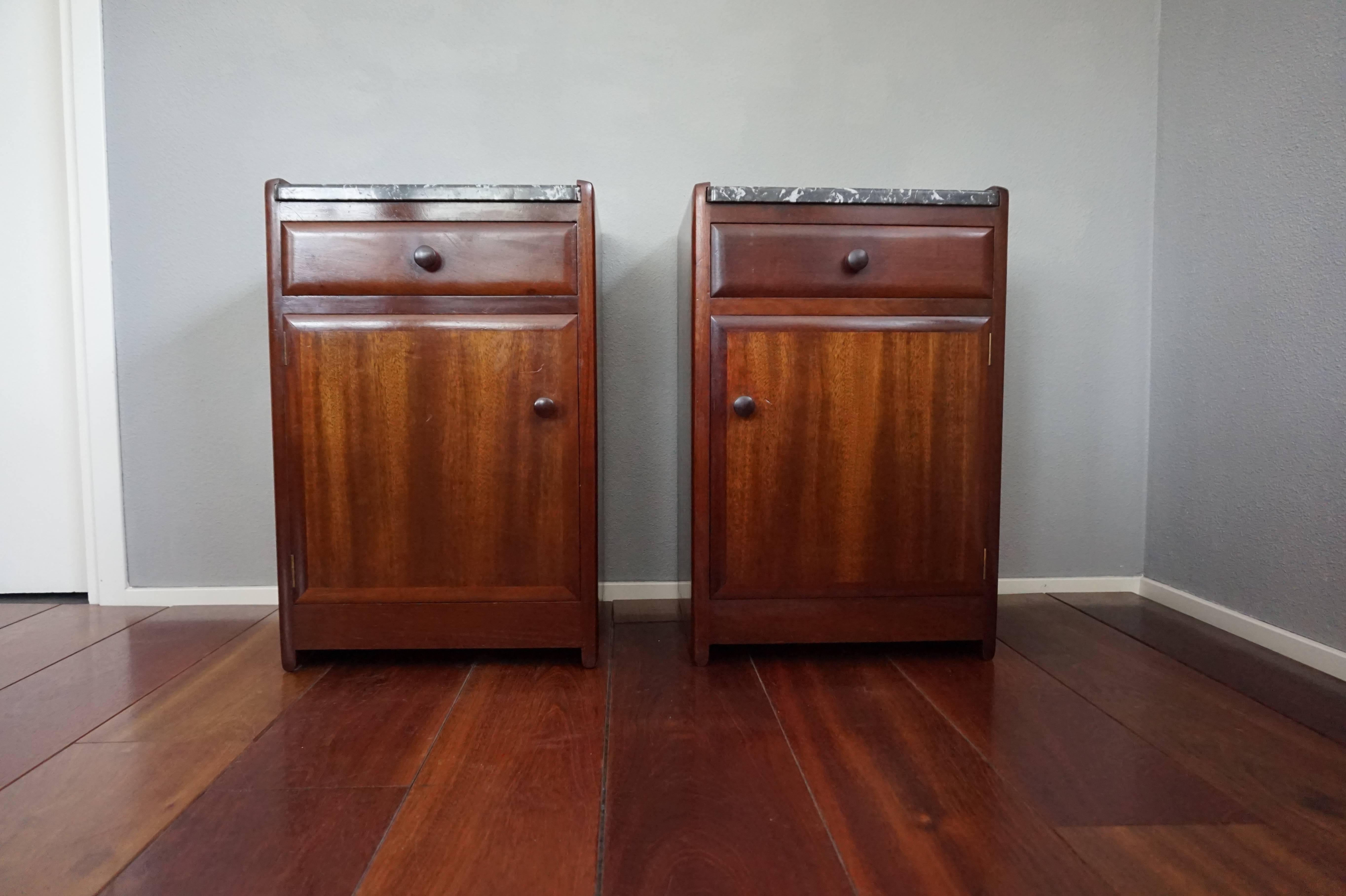 Top quality and great condition bedside cabinets by one of Holland's finest.

These beautifully designed and skillfully handcrafted night stands date from the 1920s. They were made by Meubelfabriek Nederland in Groningen (Holland) owned by J.A.
