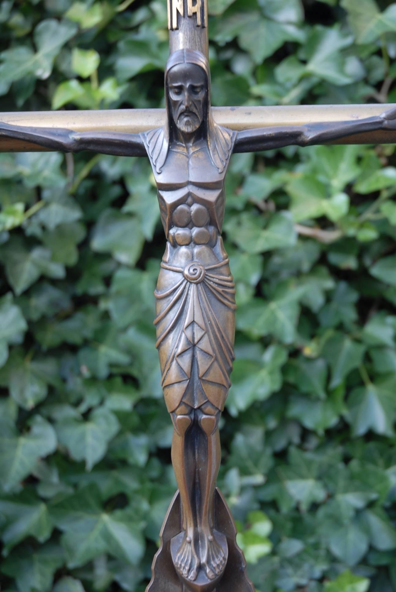 Rare crucifix and a wonderful Art Deco work of religious art.

It will be very difficult to ever find a more beautifully designed and geometrically and symmetrically perfect, Art Deco Christ sculpture. This truly is a stunning and impressive work of