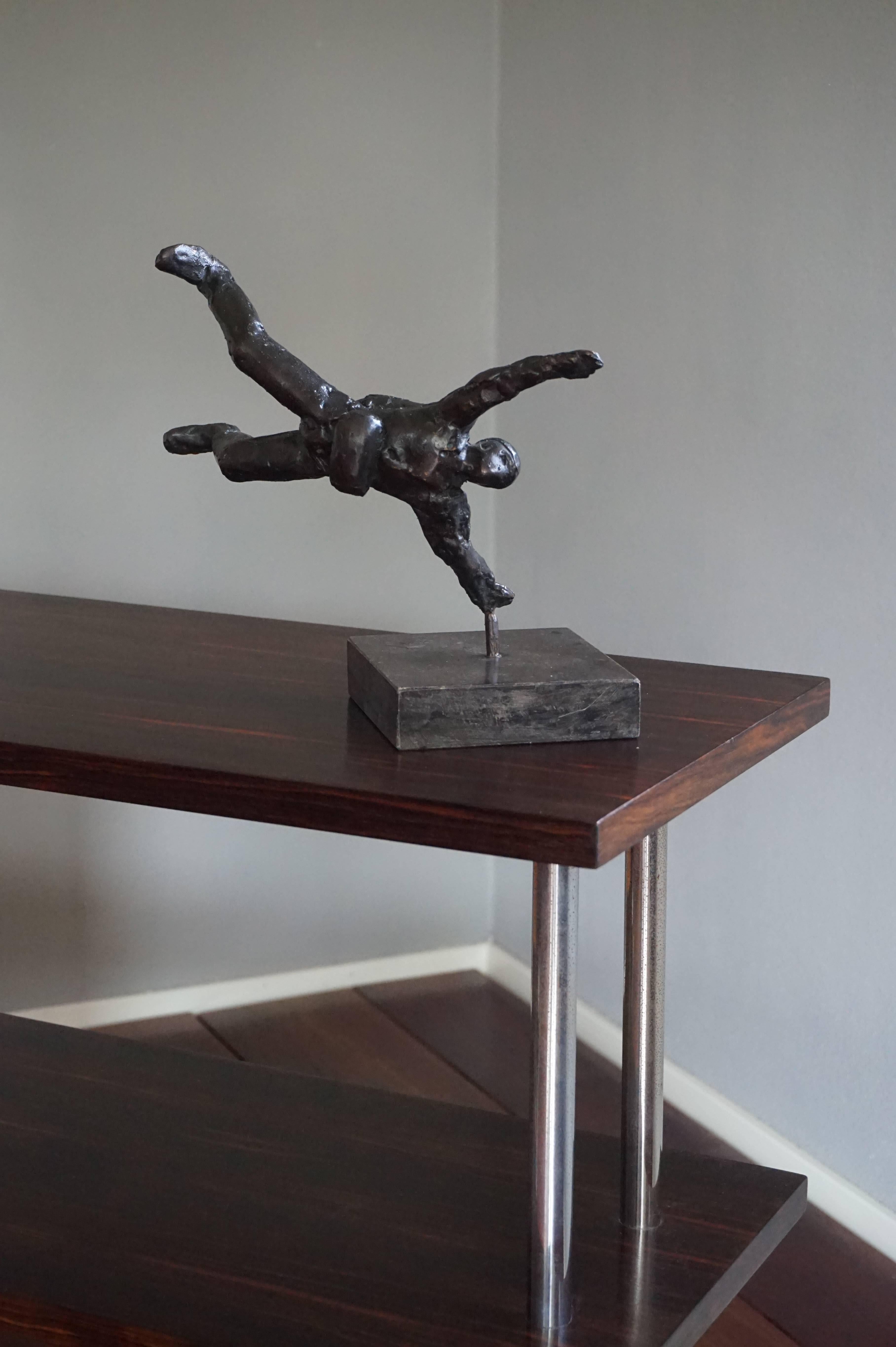 Super cool and rare bronze parachutist.

If it is your passion to jump from an airplane and feel the rush of falling at a speed of approx. 120 miles per hour then this wonderful bronze sculpture could be the perfect reminder of that feeling. This