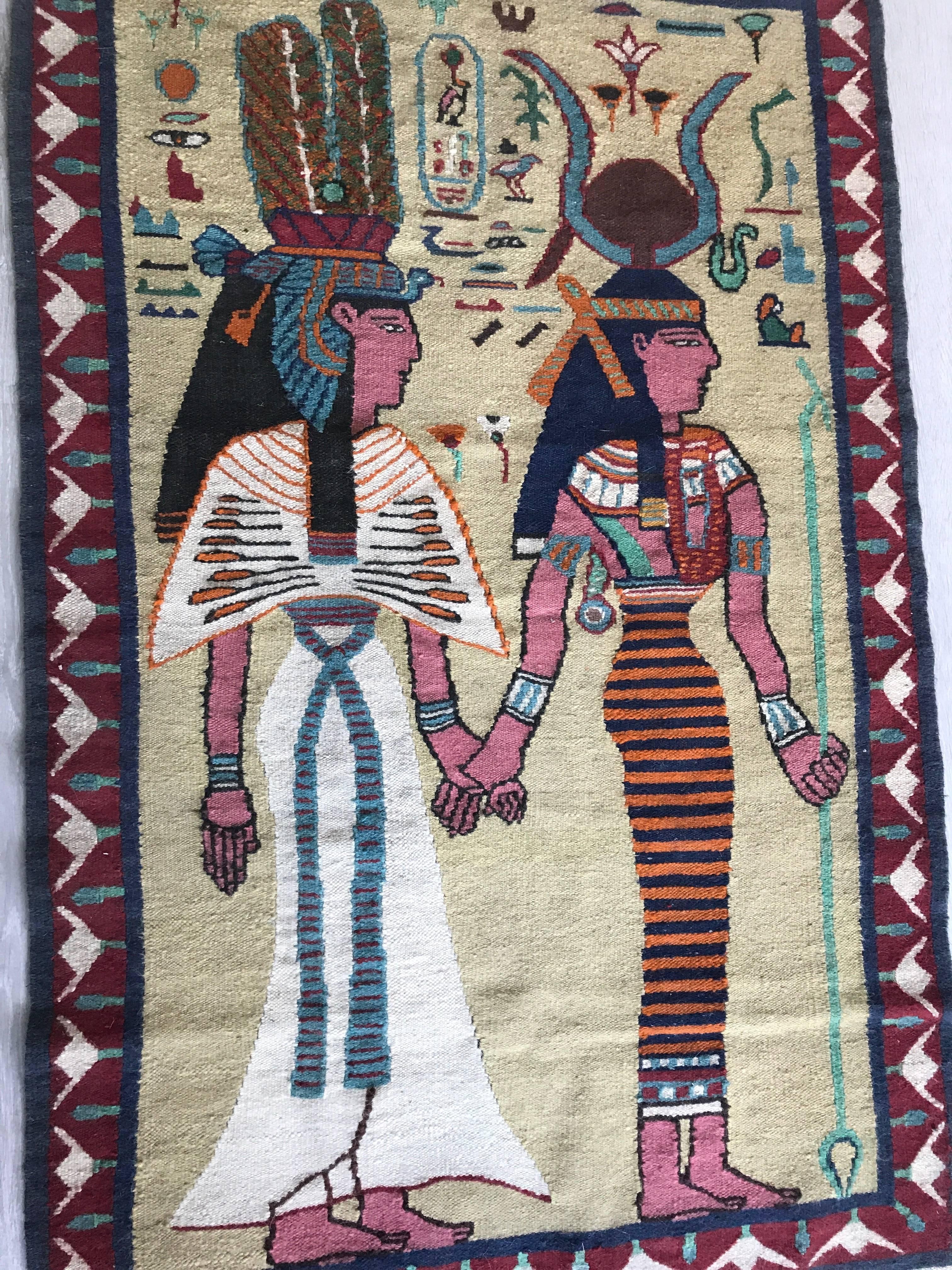 Near antique carpet depicting the two goddesses Isis and Hathor.

This rare and handwoven carpet depicting two symbols of Egyptian spirituality can also be used as wall hanging. This is a unique opportunity for Egyptologists and for lovers and