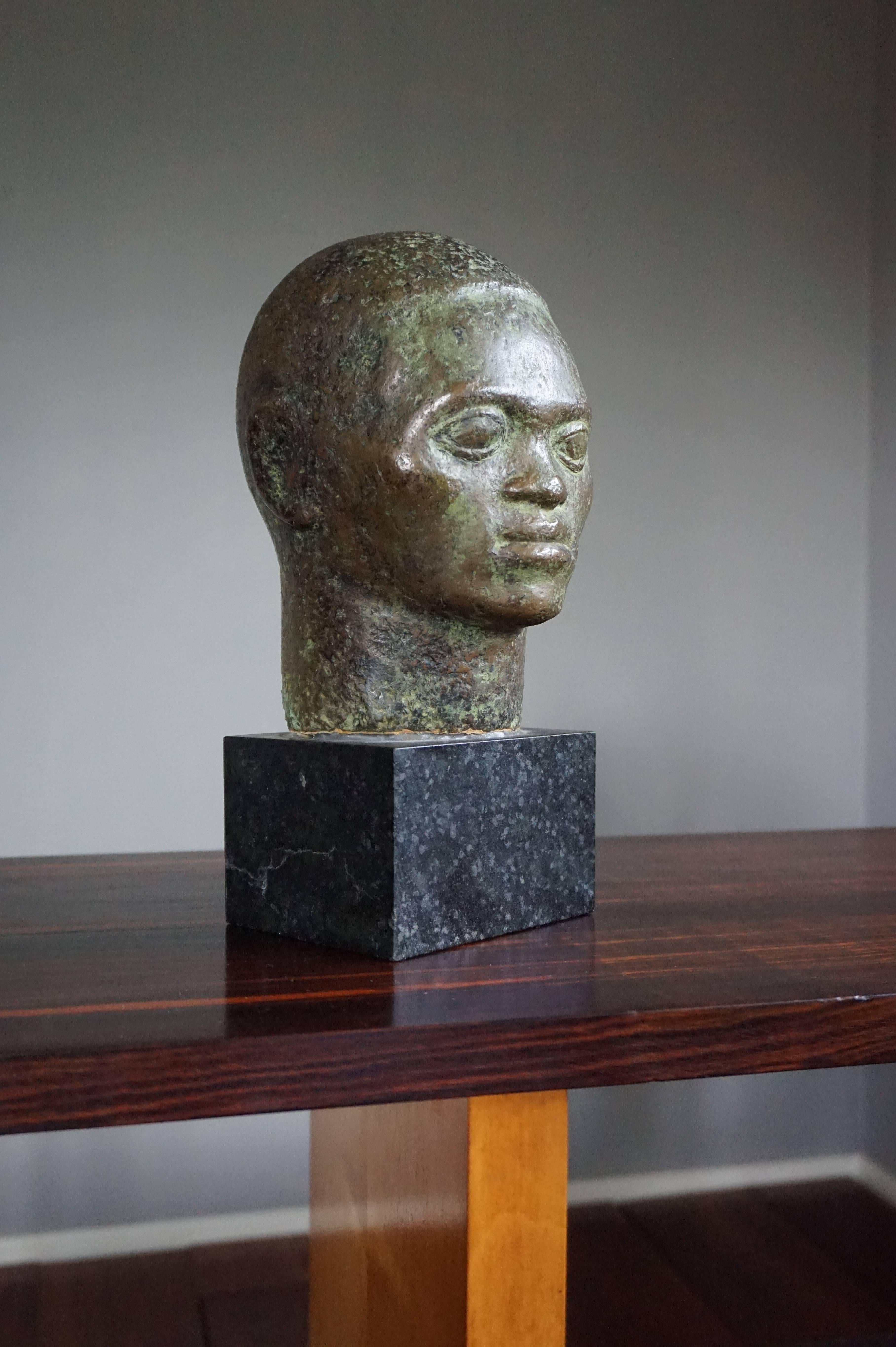 European Small to Mid Size, Rare and Serene African Male Bronze Bust on Black Marble Base