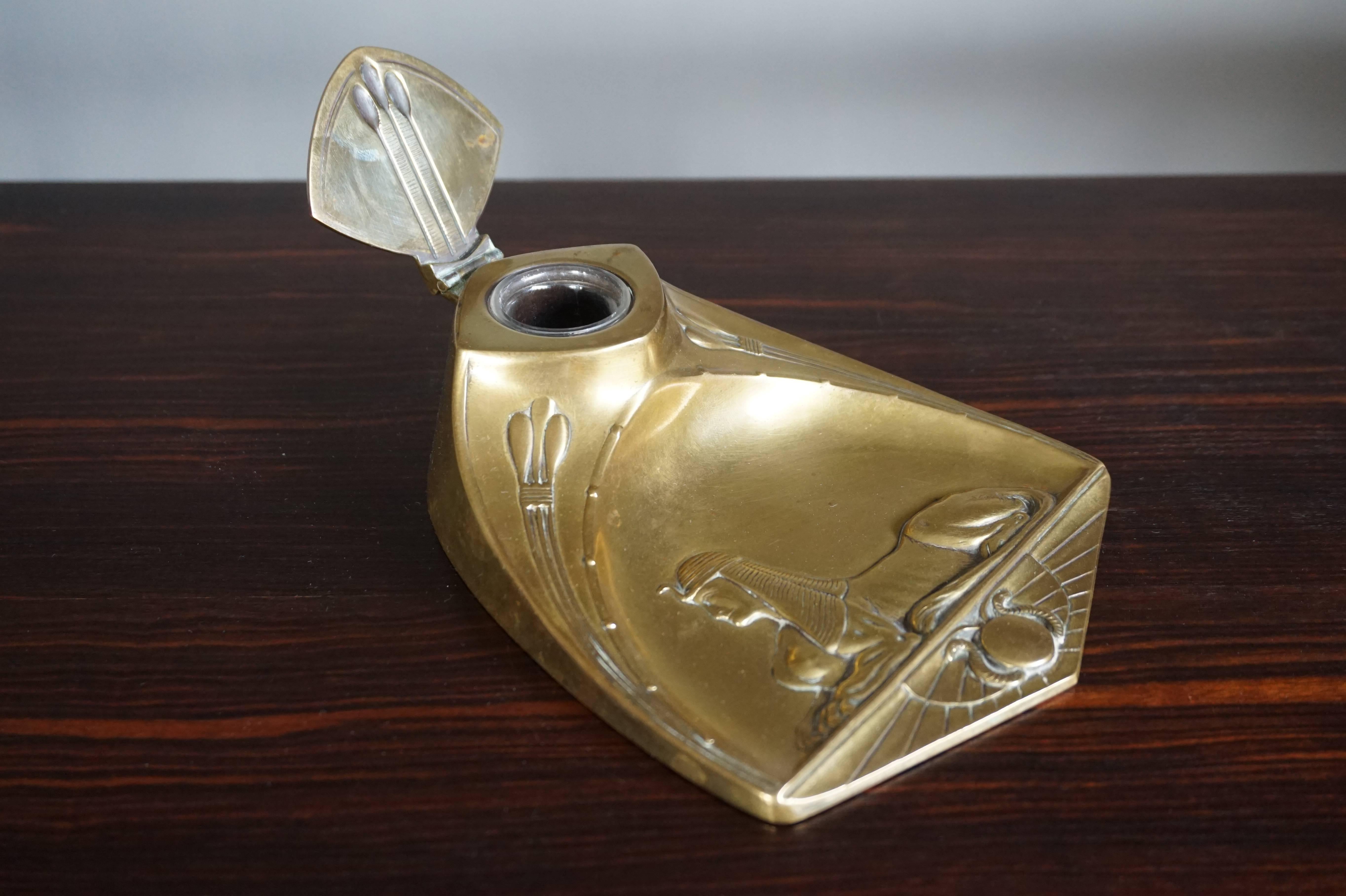 Stylish, rare and mint Egyptian Revival brass desk piece.

This completely original WMF inkstand dates from circa 1900. To find such a rare antique in museum quality condition, again, felt like a blessing. The Egyptian Sphinx is a sign of wisdom and