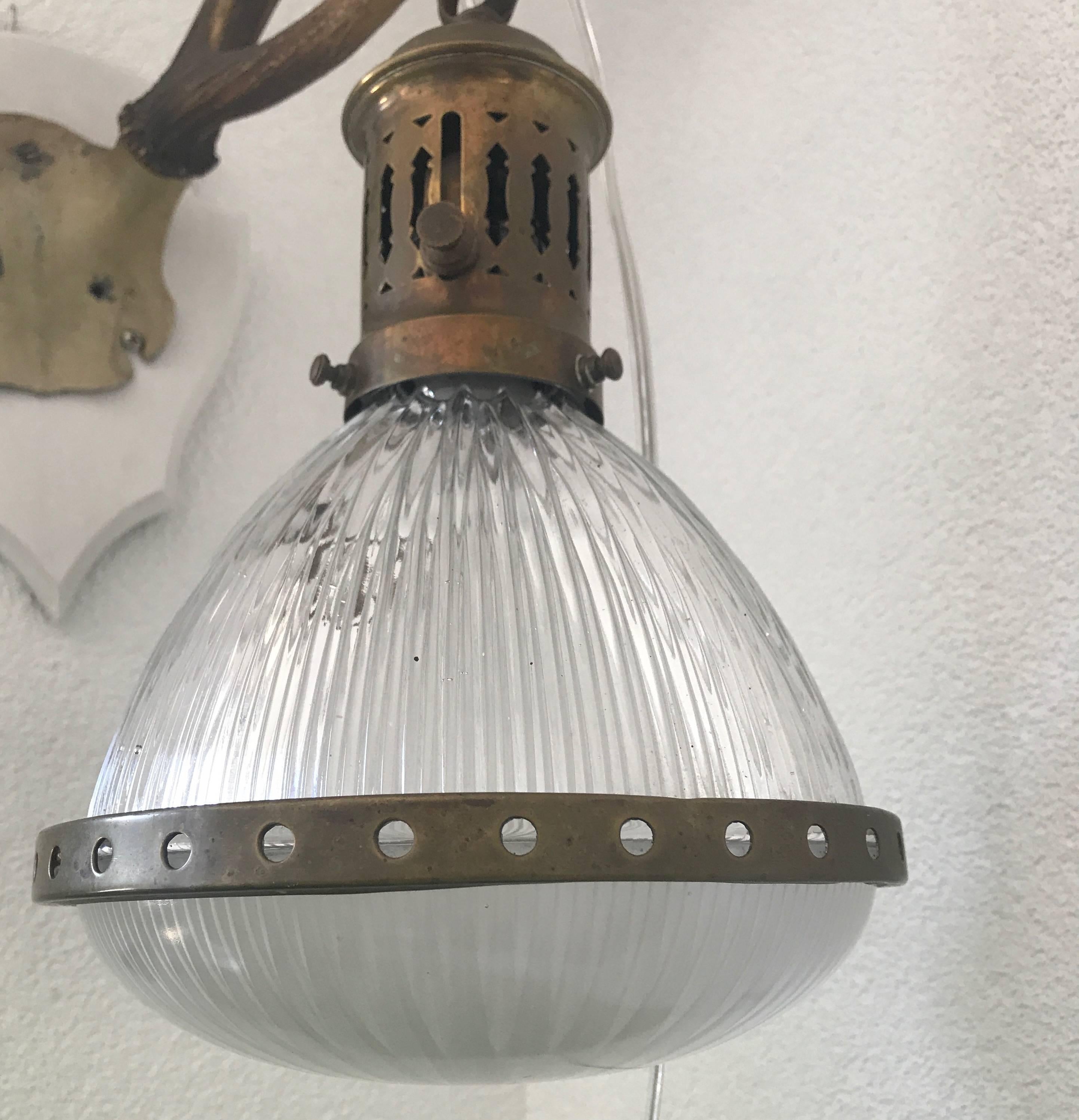 Rare size and striking Art Deco pendant, circa 1920. 

If you are looking for the ideal pendant to light up your entrance, restroom or small bedroom then look no further. This fine Art Deco ceiling lamp with stunning glass shades is marked by
