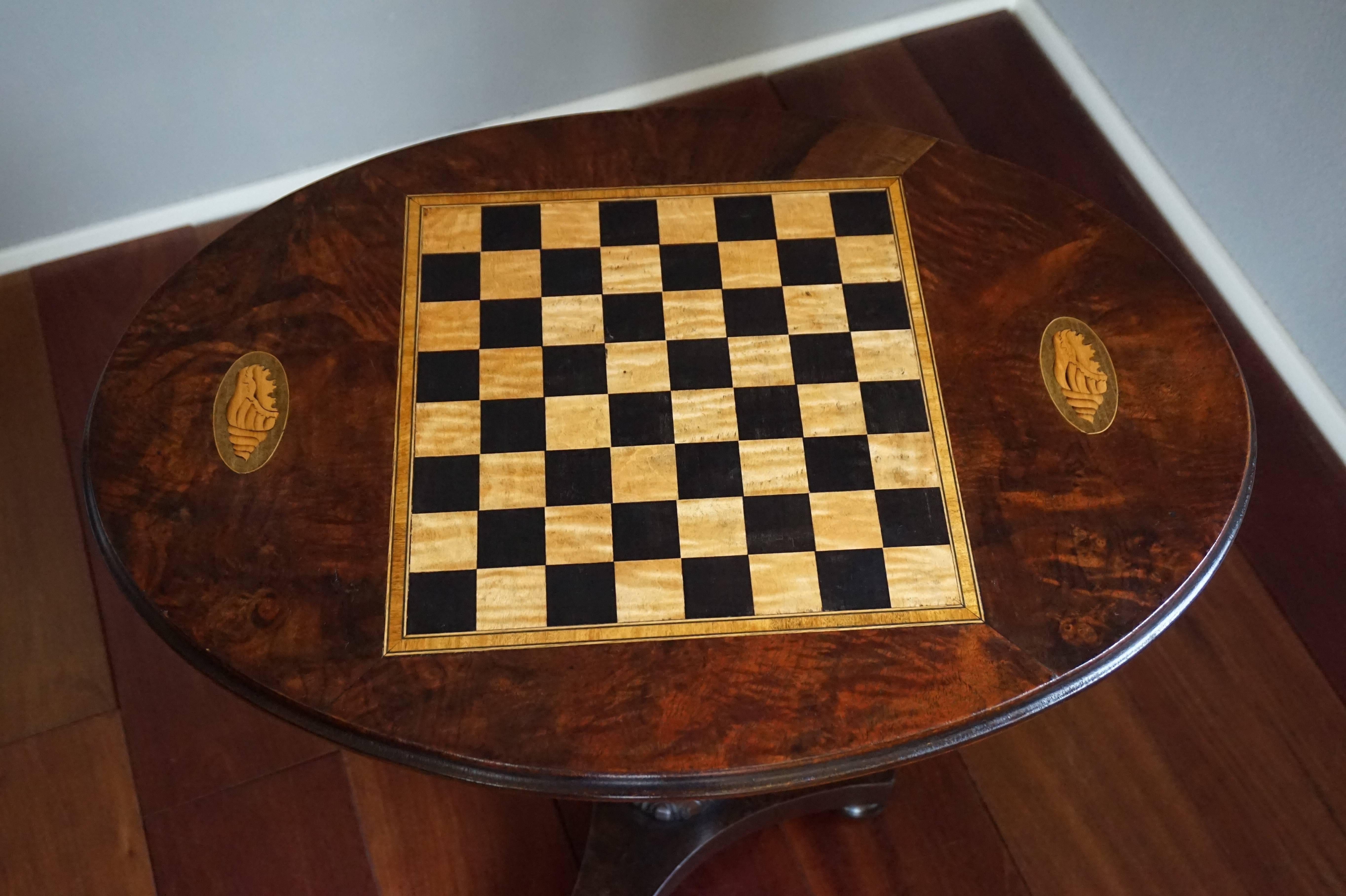 Stunning and practical size, oval chess table inlaid with satinwood.

If you are chess playing enthousiast and you like to play the game of chess with family or friends then this table could be perfect for you. Even if you hardly play at all, it is