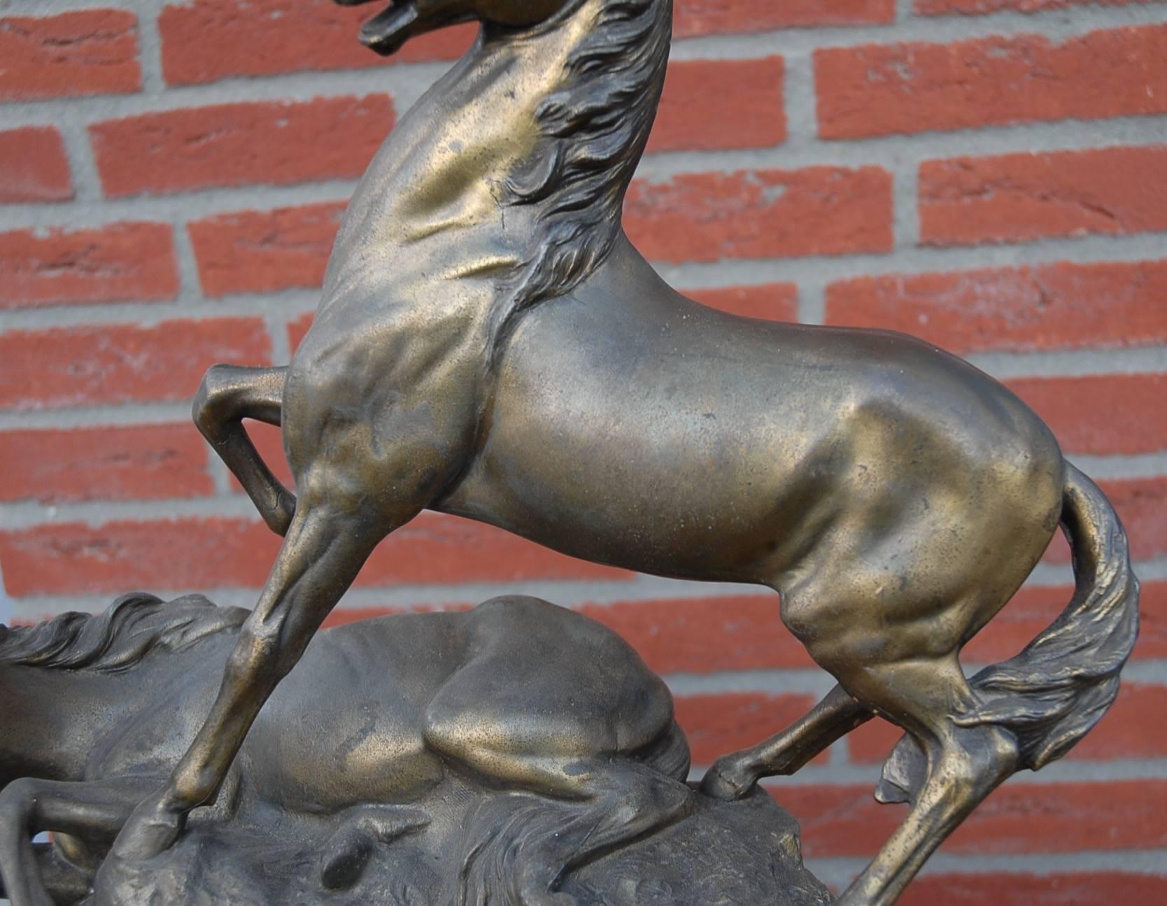 Cast Rare Detailed and Decorative Early 20th Century Fighting Wild Horse Sculpture For Sale