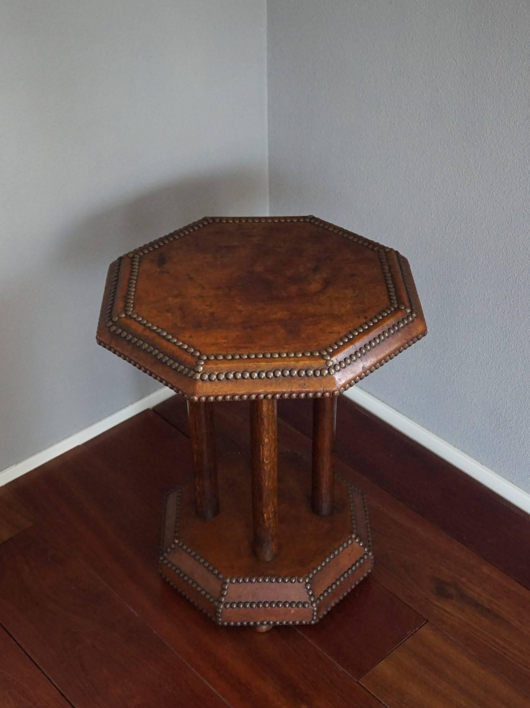 Wonderful, sheepskin leather Art Deco table.

This handcrafted oak and leather table is of a timeless design and it will look great in all kinds of interiors. The aging of all three materials combined has given this wonderful and rare table its