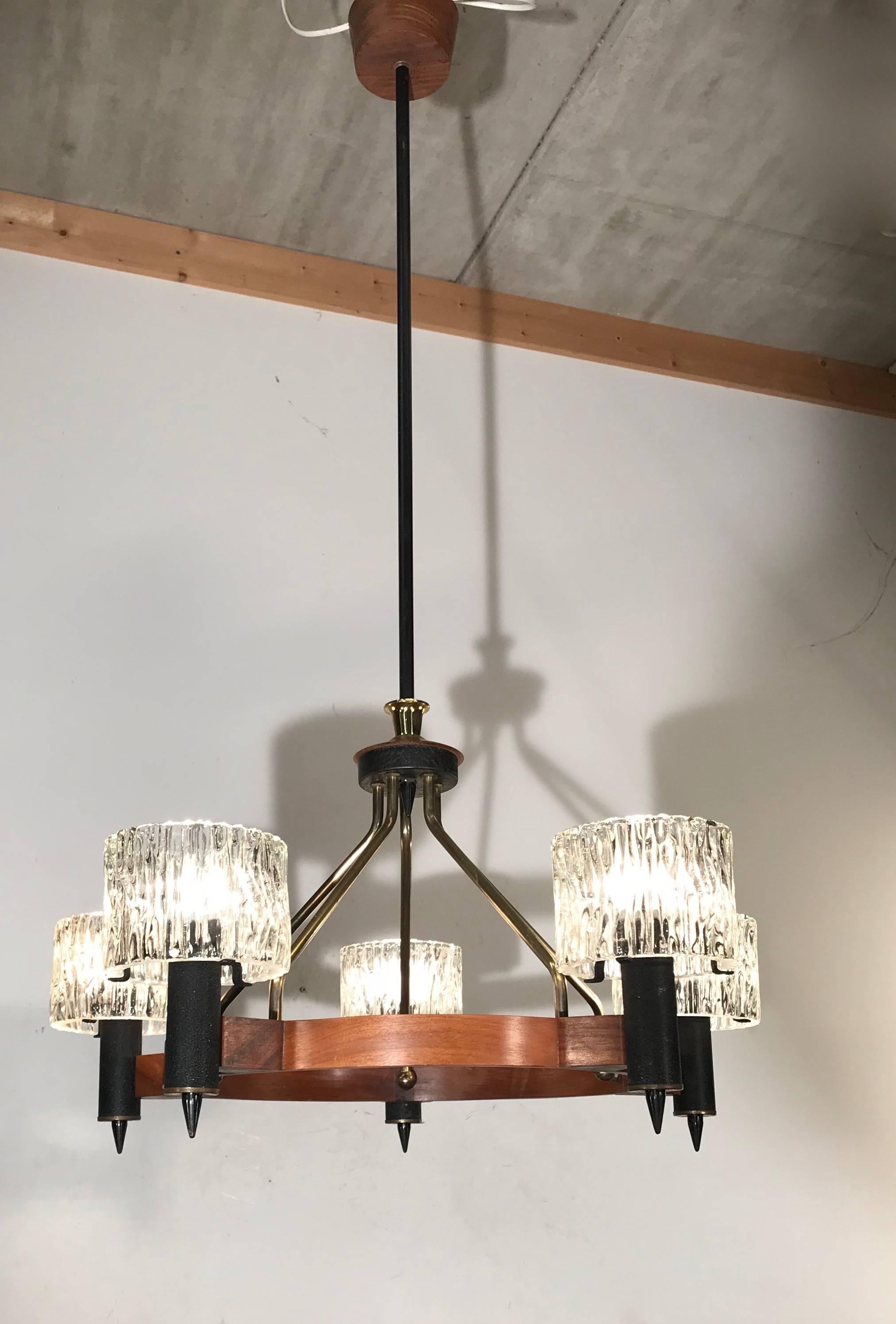 Beautiful and rare Scandinavian design light fixture.
 
This great looking, midcentury pendant by Swedish designer Carl Fagerlund really stands out. It is the combination of various materials combined with the wonderful shapes of each individual