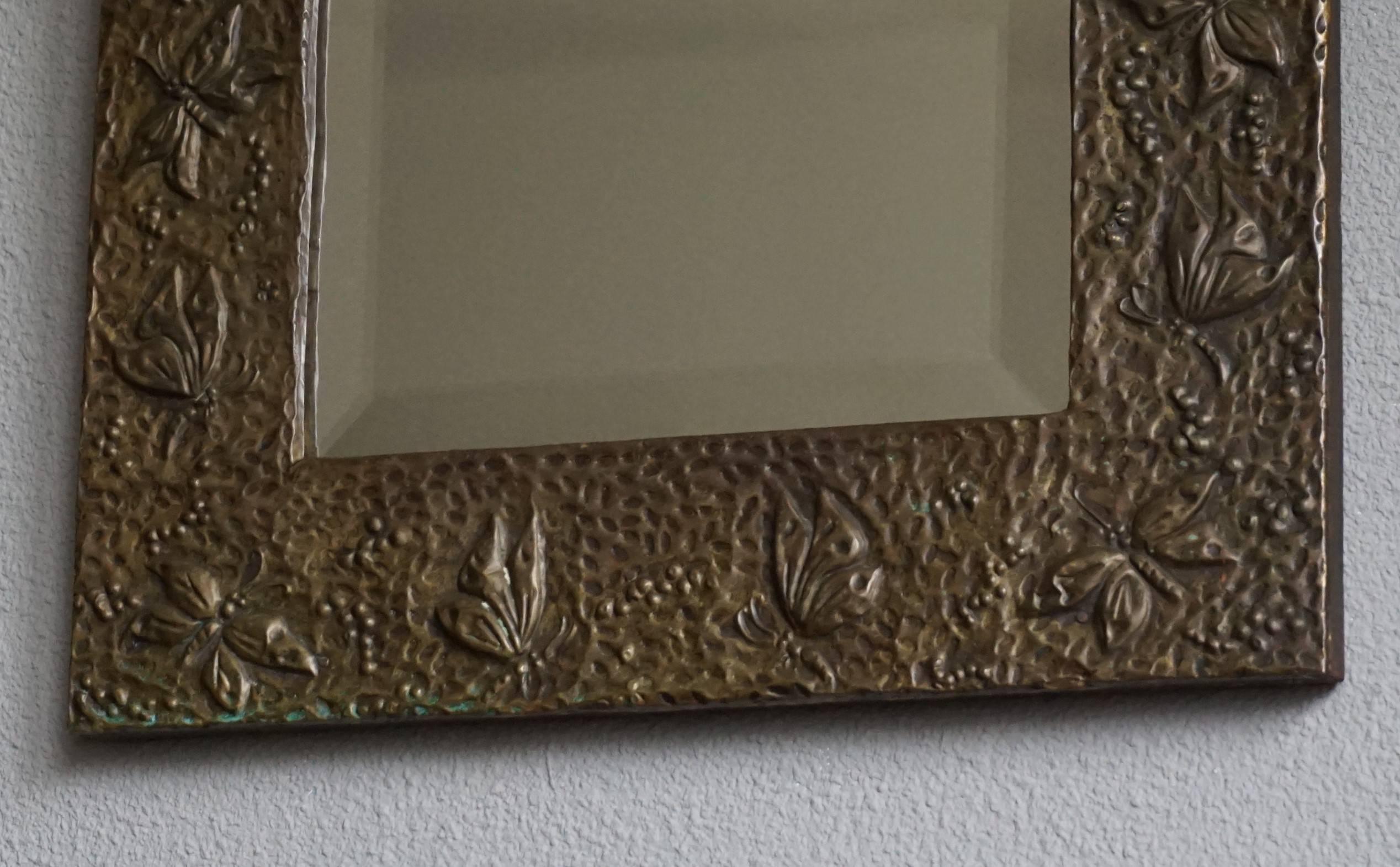 One of a kind Arts and Crafts mirror frame with the original and mint beveled mirror.

This unique Arts and Crafts mirror has been looked after very well. Previous owners fortunately have appreciated and respected this wonderfully made Arts and