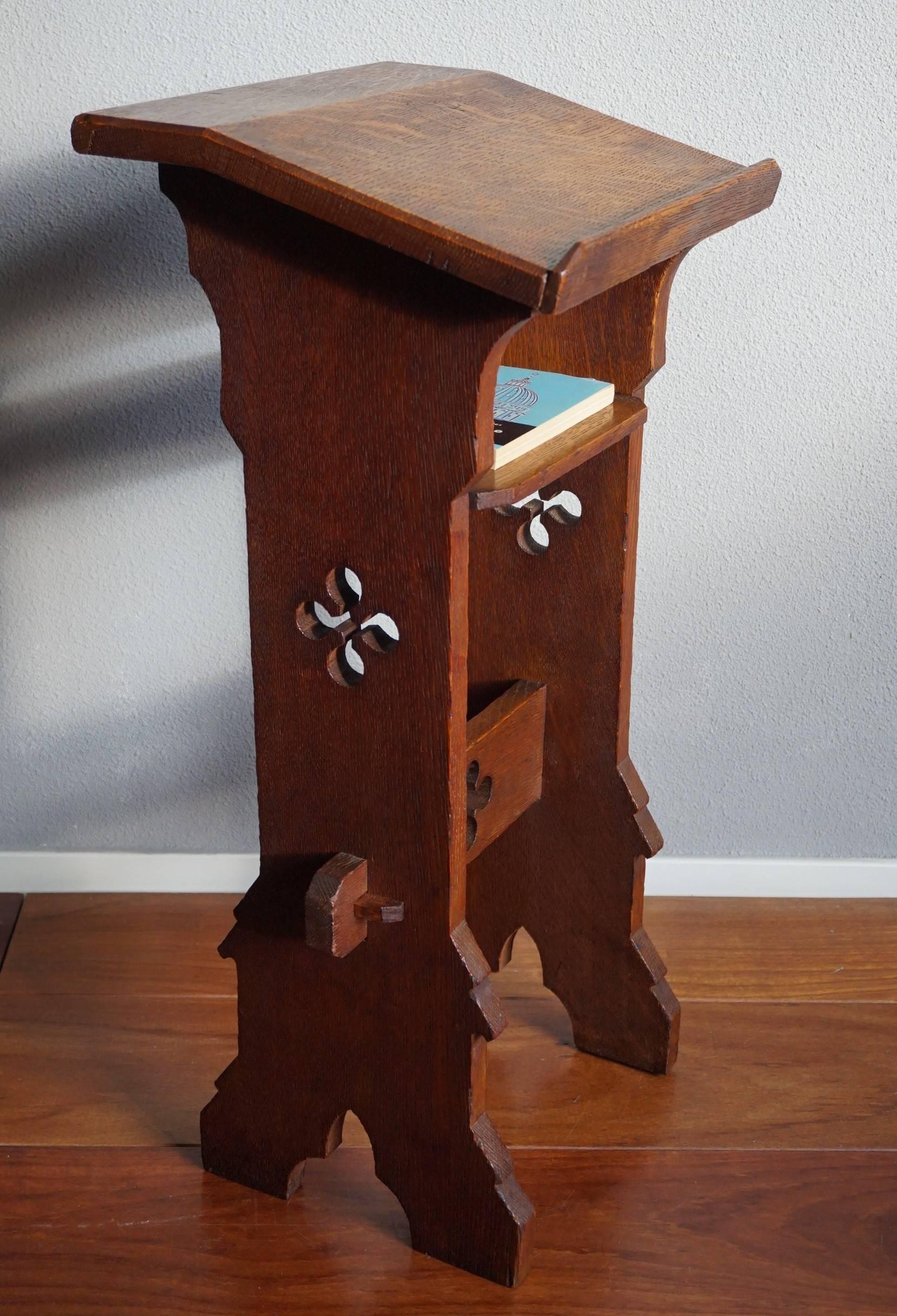Antique and small size church bible stand.

We are not sure if this handcrafted bible Stand was made for a child or for someone who is kneeling or in a chair, but it is a wonderful piece of antique church furniture and an absolute joy to own and