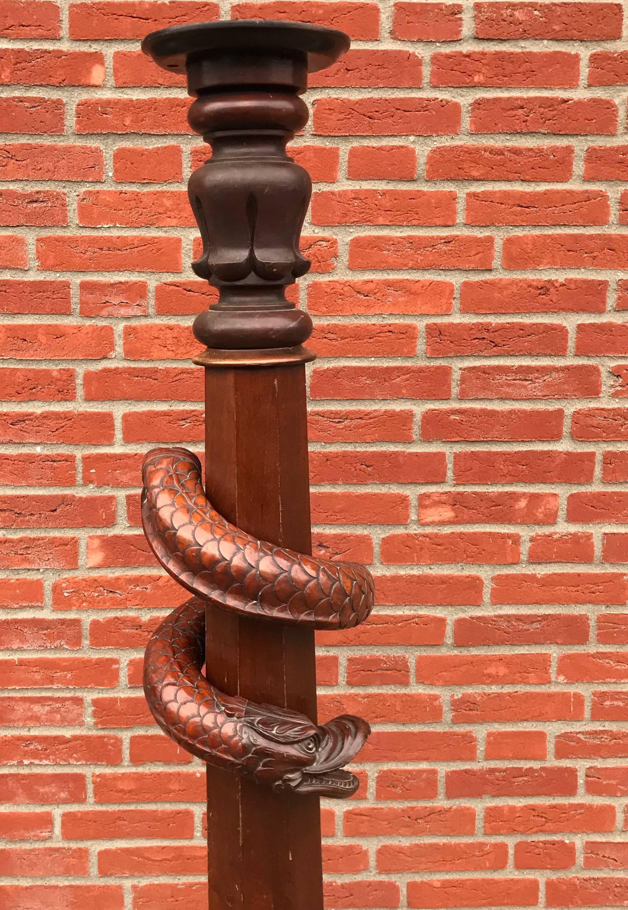 One of a kind, sculptural stair newel post from the 1800s.

This unique home accessorie can only and exclusively have been hand-crafted for a 19th century mansion or public building and we think it is of German origin. This stair newel post is