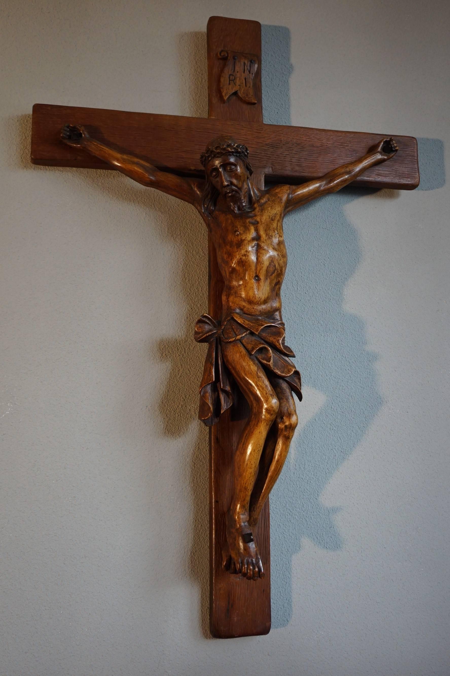 One of a kind, large crucifix with an amazing patina.

This remarkable and sizeable corpus of a suffering Christ on the cross is different to almost all others. The artist who hand-sculpted this impressive work of religious art has not chosen to
