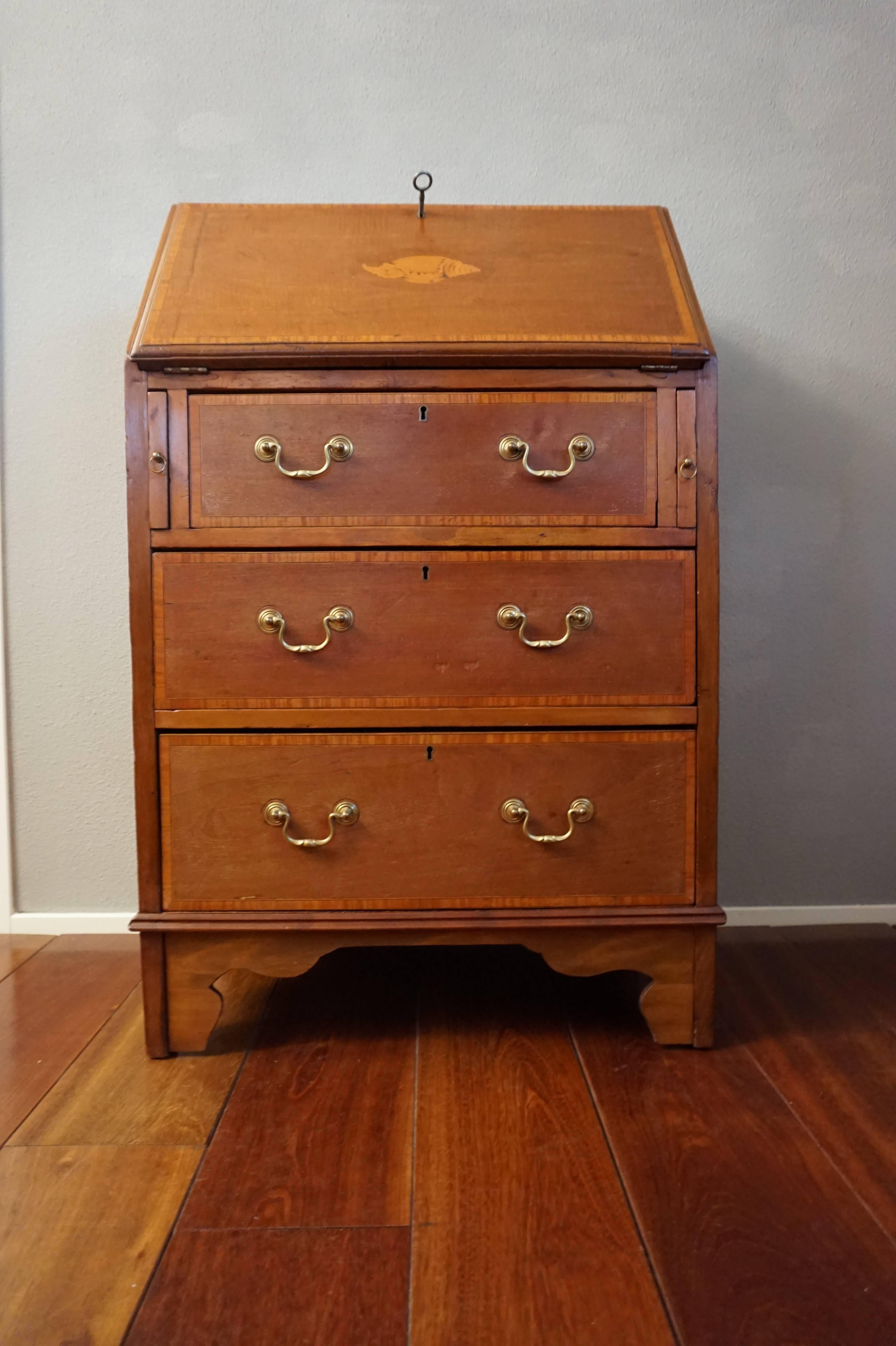 Practical small desk with a built-in chest of drawers.

Because of the large homes that many of the rich who could afford quality furniture lived in, many antique pieces of furniture are relatively large. Since that is not always practical in this