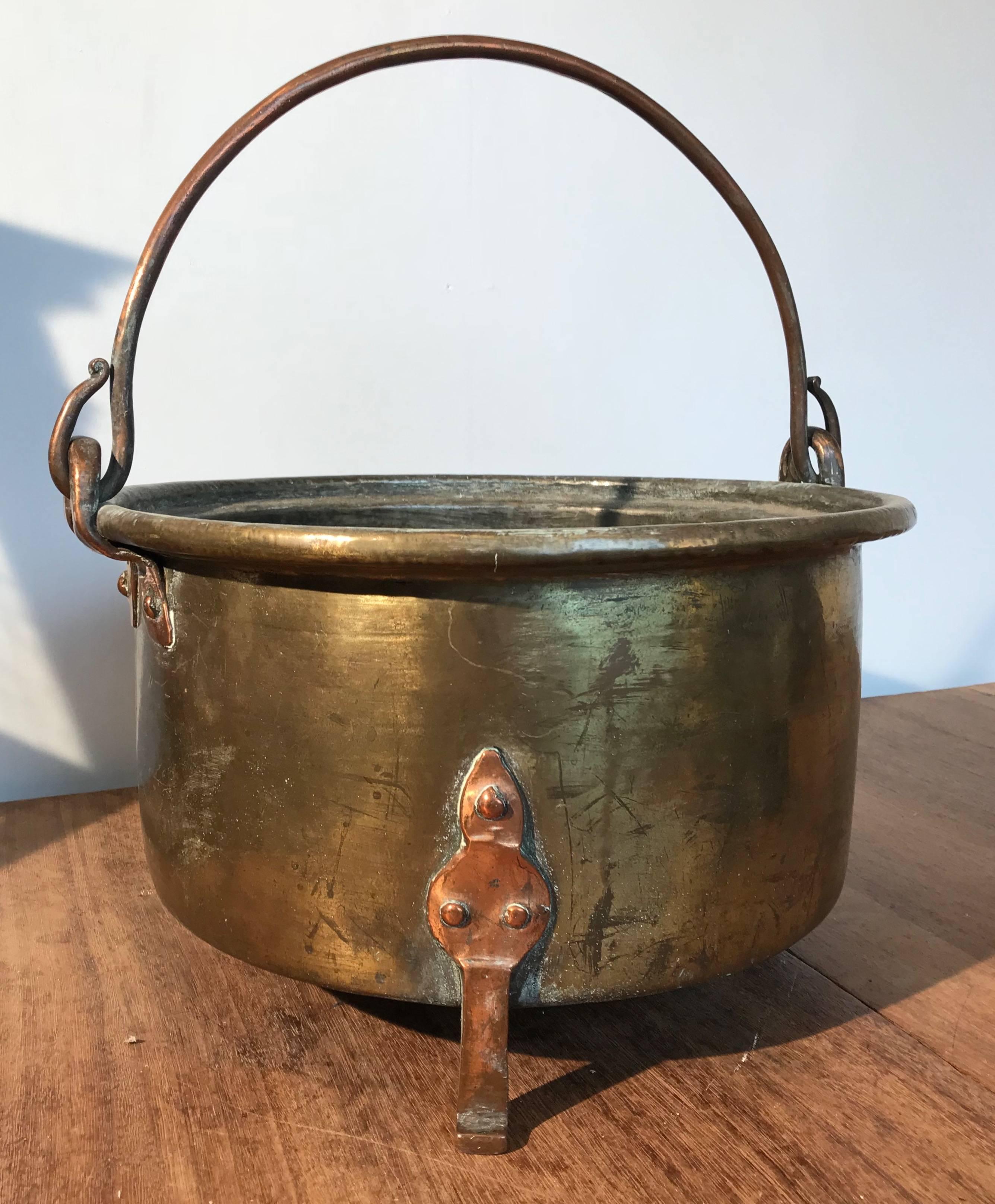 Sizable and thick quality, brass collecting bucket.

This sturdy and heavy brass bucket is another one of our recent finds. When used as a log bucket, this handcrafted antique can single handedly change the look and feel of your fireplace. When used