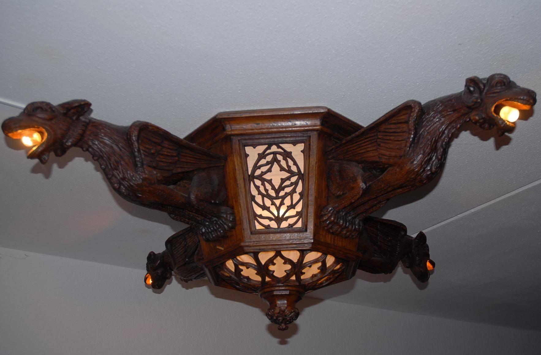 Amazing, hand-carved, Gothic Revival work of lighting art.
 
This amazing ceiling lamp did not come from your average home and finding this gem totally made our day. It is most likely that it was initially made for a church or monestry and we were