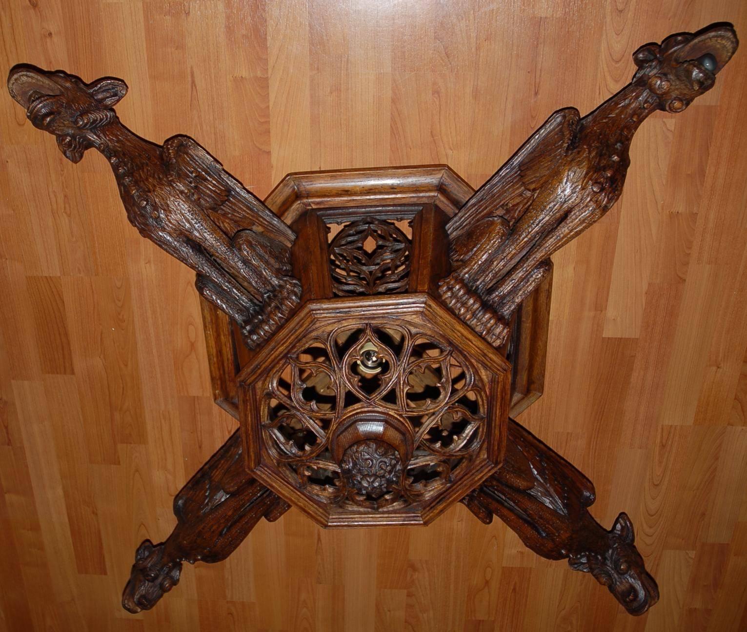 Enormous Hand-Carved Gothic Revival Art, Four Gargoyles Ceiling Light Fixture In Good Condition In Lisse, NL