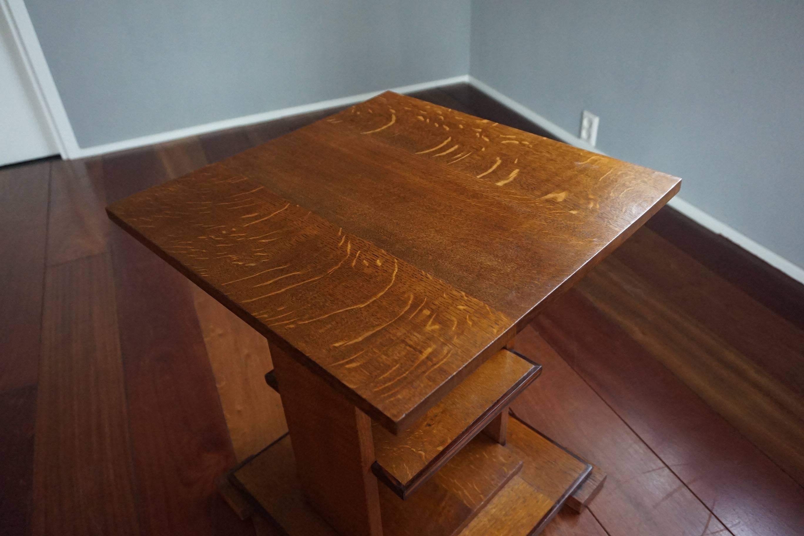 Museum quality and condition, three-tier table.

Finding the right furniture for your house or apartment can really help making you feel better and truly at home. This geometric and perfectly symmetric Arts and Crafts design from the 1910s is one of