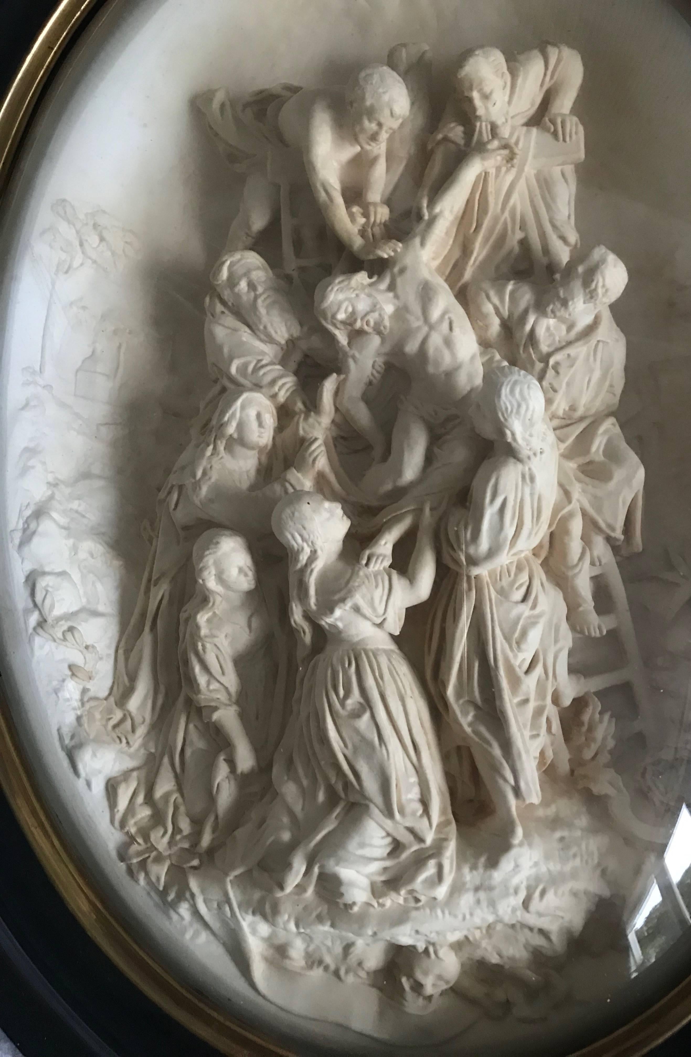 Beautiful quality-carved, work of Christian art.

This impressive sculpture out of sepiolite depicts the descent of the deceased Christ from his cross. Sepiolite is formed in burns on various coasts and it is a soft, white clay mineral. The tender