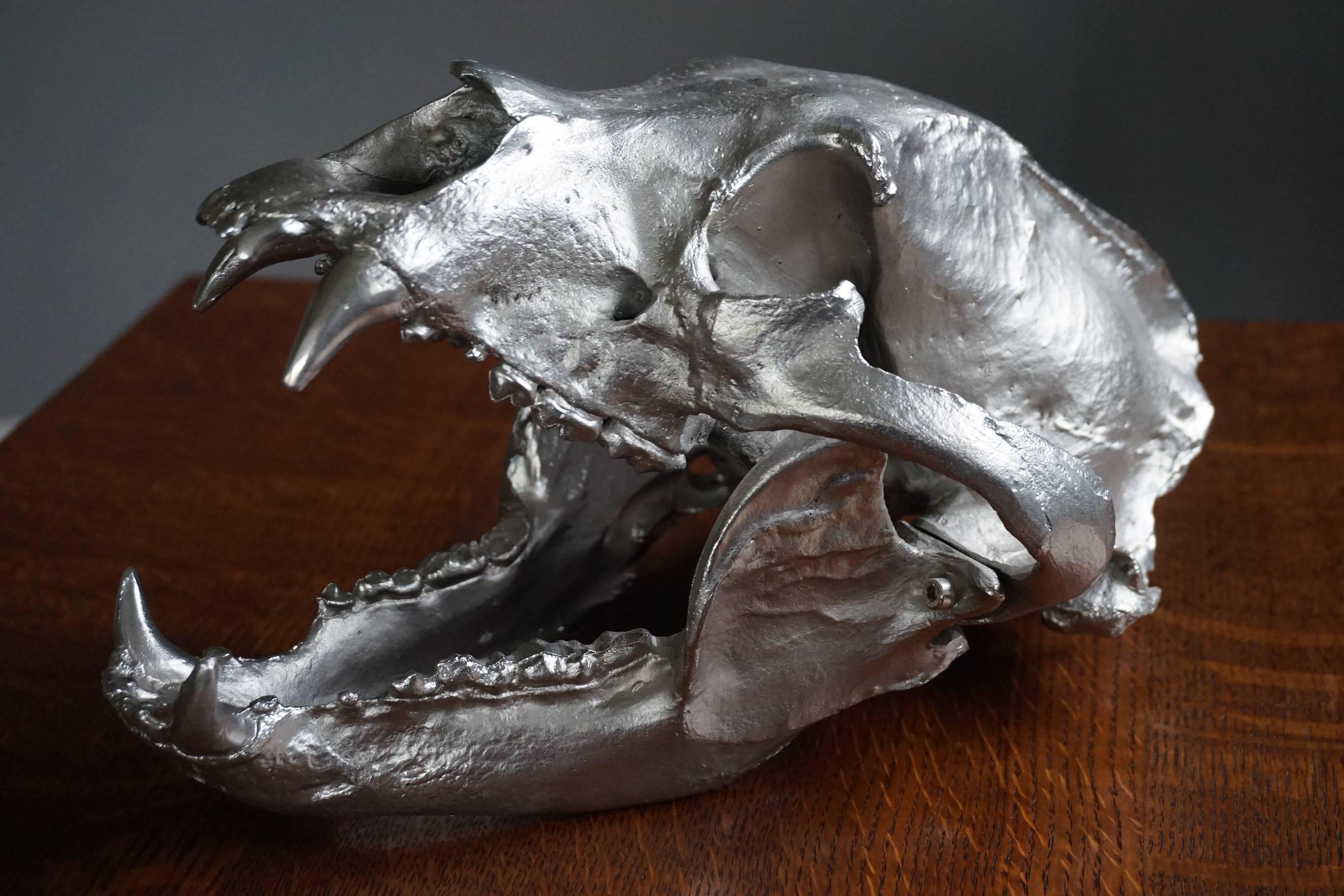 Exact replica of a black bear skull, cast in bronze.

This cool, cast bronze skull is an exact replica of a black bear skull. Less than 20 were made and three years ago they all came into our possession when we bought the entire inventory of a