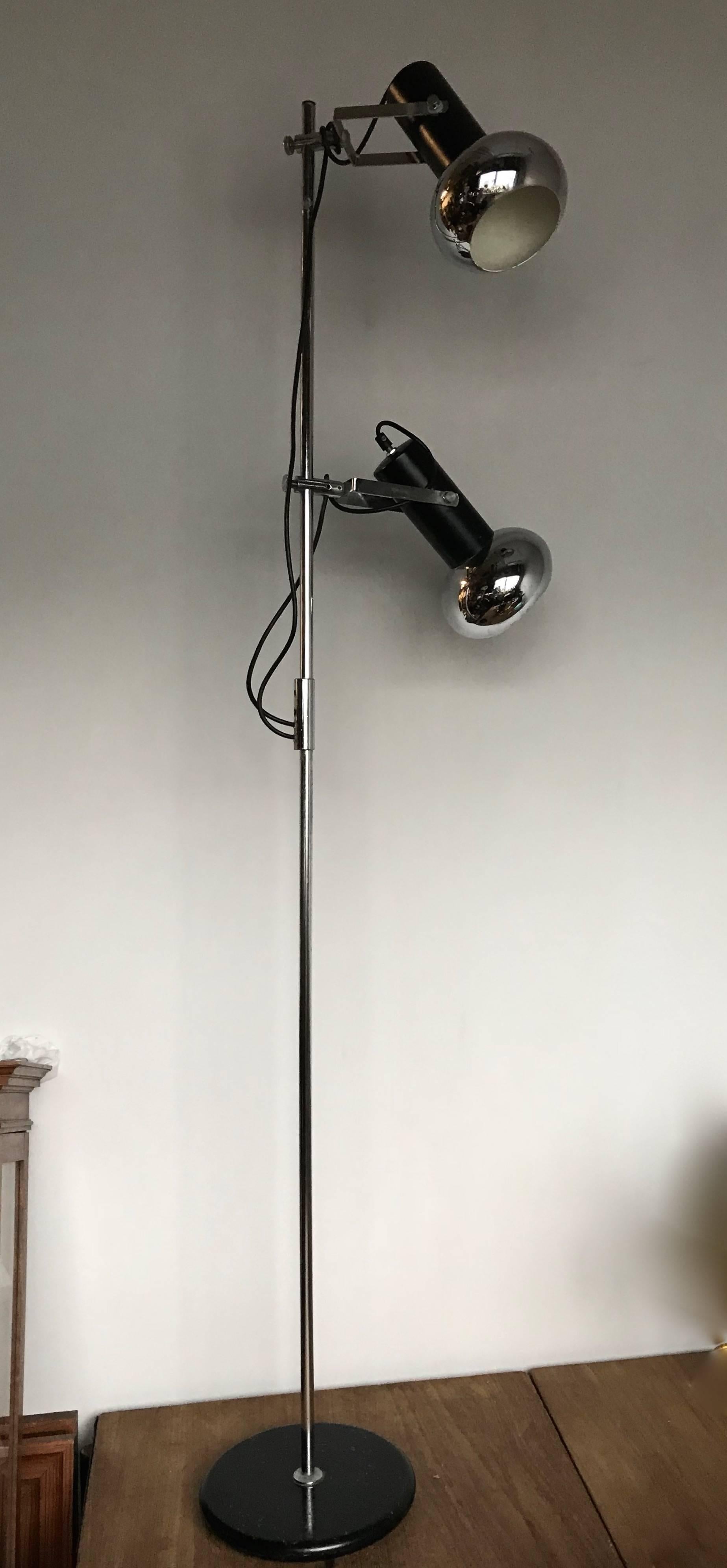 Stylish and practical floor lamp.

This quality made floor lamp of chrome and blacked metal could be your perfect lighting solution. This timeless, midcentury design can be used for all kinds of purposes and thanks to the colors it can be placed in