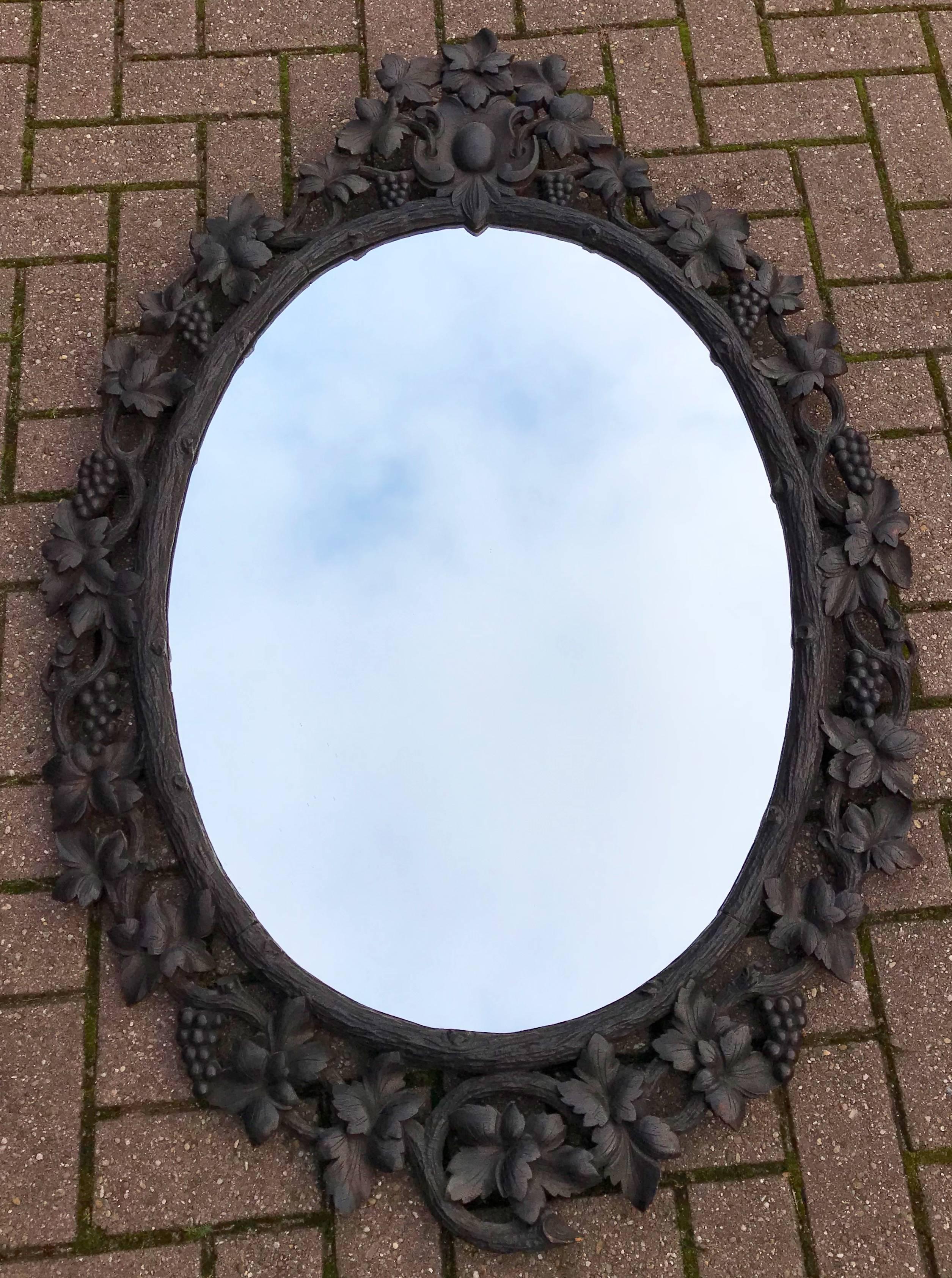 Large Antique Black Forest Oval Mirror in Carved Nutwood Picture Frame 1