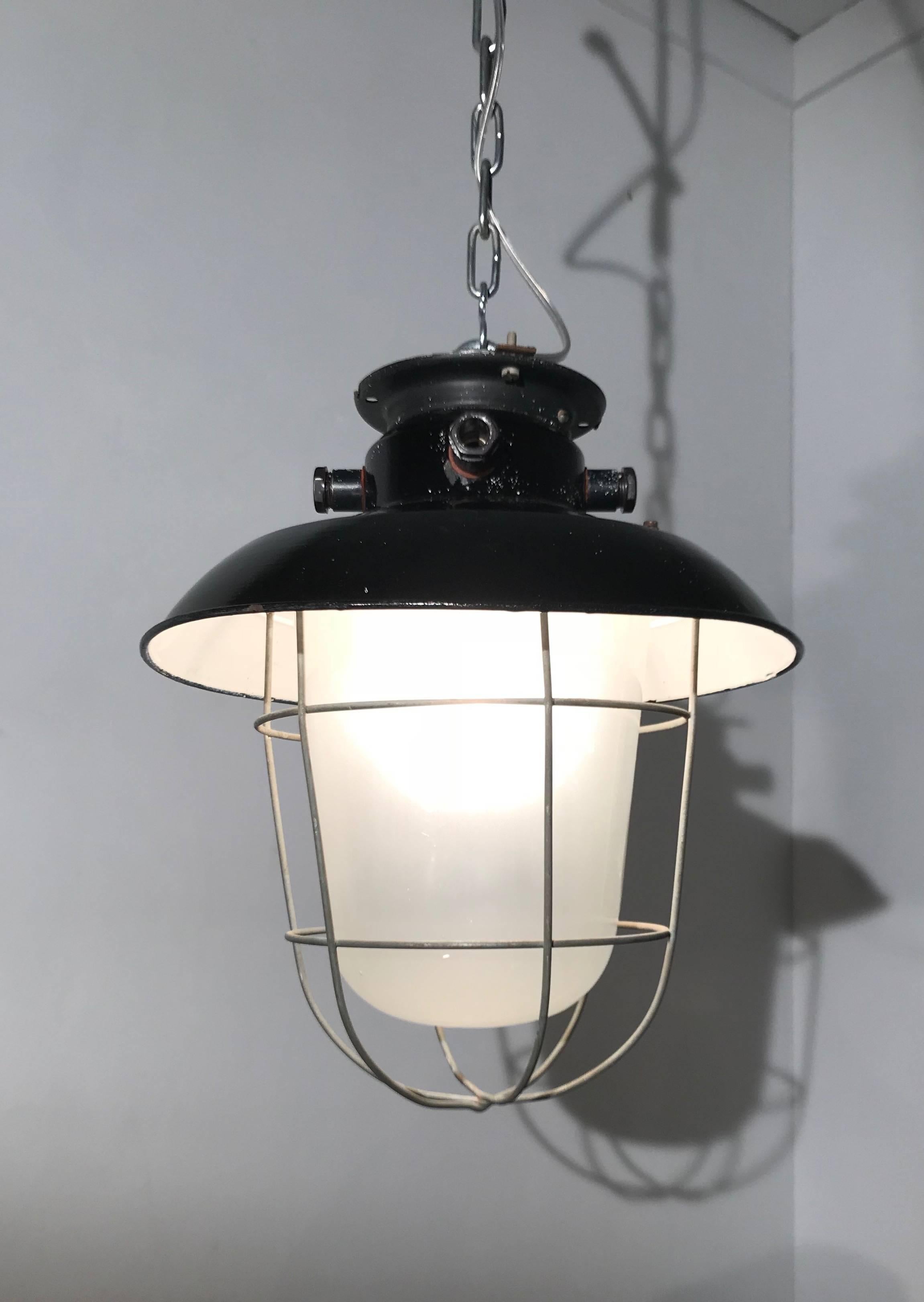 1920s Matching Pair of Industrial, Glass & Black Enamel Caged Light Pendant In Good Condition For Sale In Lisse, NL