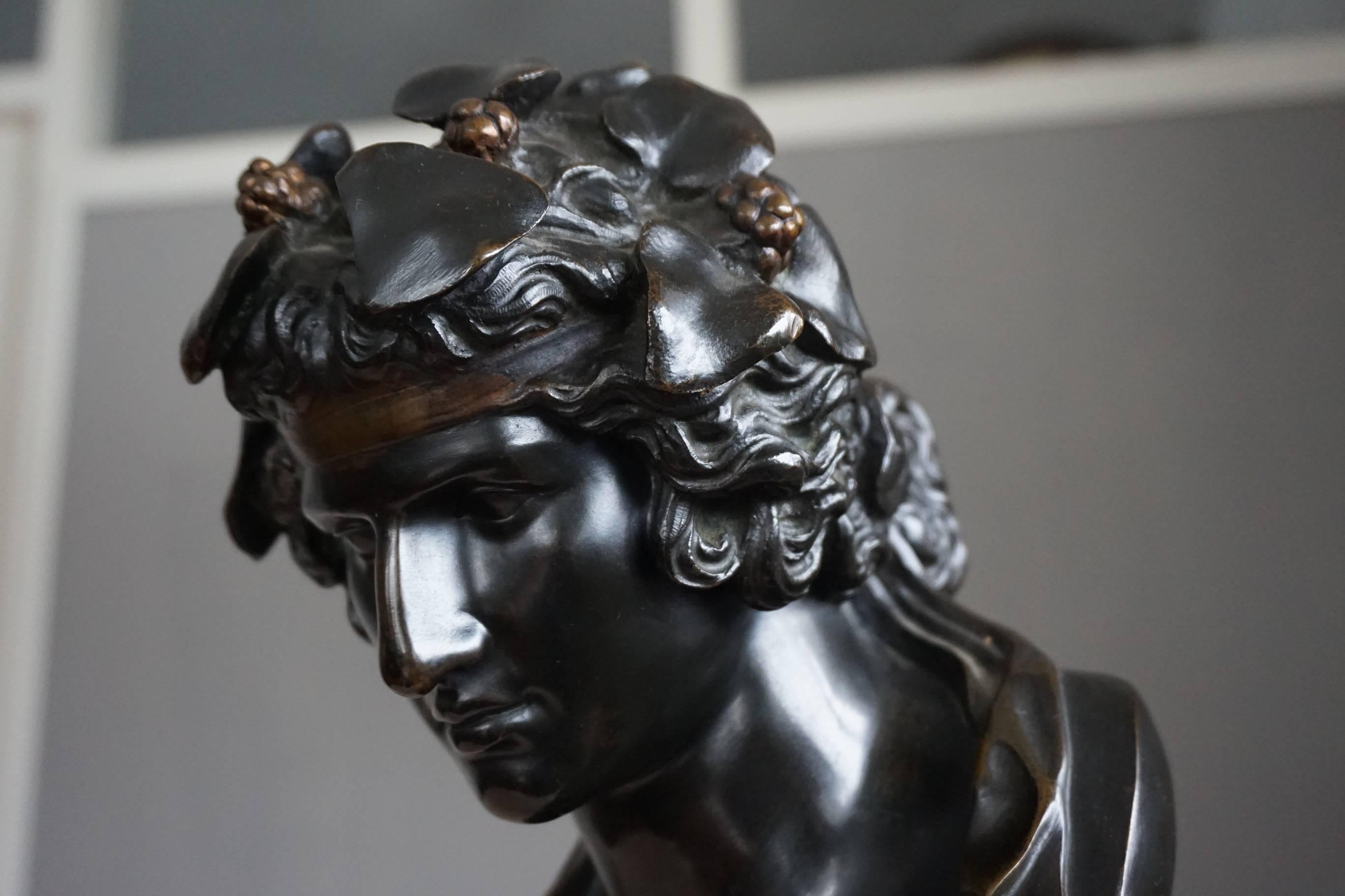 Stunning and rare bronze bust.

This practical size bronze sculpture is of a timeless beauty and we are confident it will soon be enjoyed by a new owner. The serene and beautiful face is that of the Greek god of wine and fertility, Dionysius. Rare
