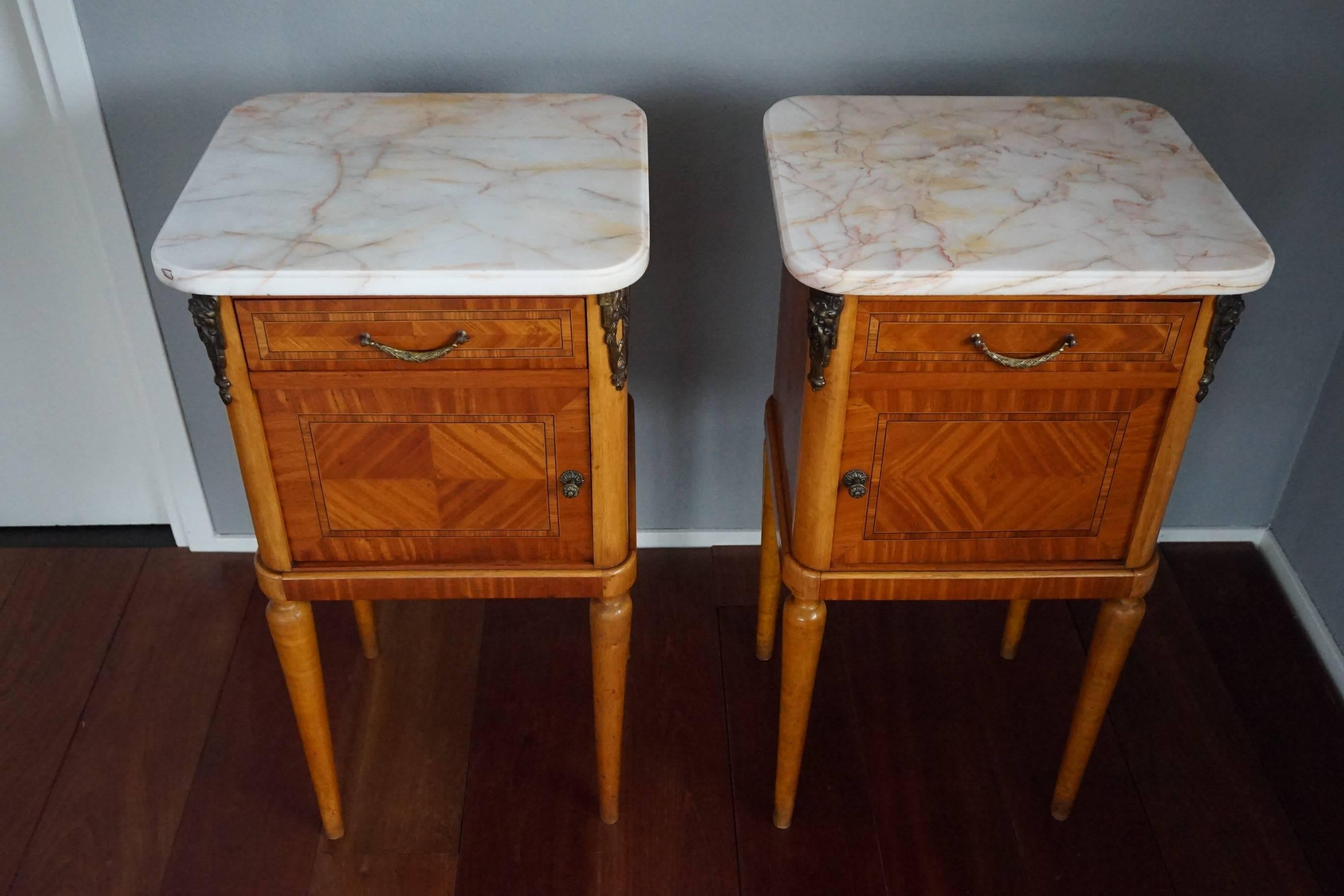 Very stylish and great quality antique nightstands.

This handcrafted, early 20th century pair of bedside cabinets is good condition and their look and feel is simply wonderful. The patina and the patterns in the wood are second to none and the