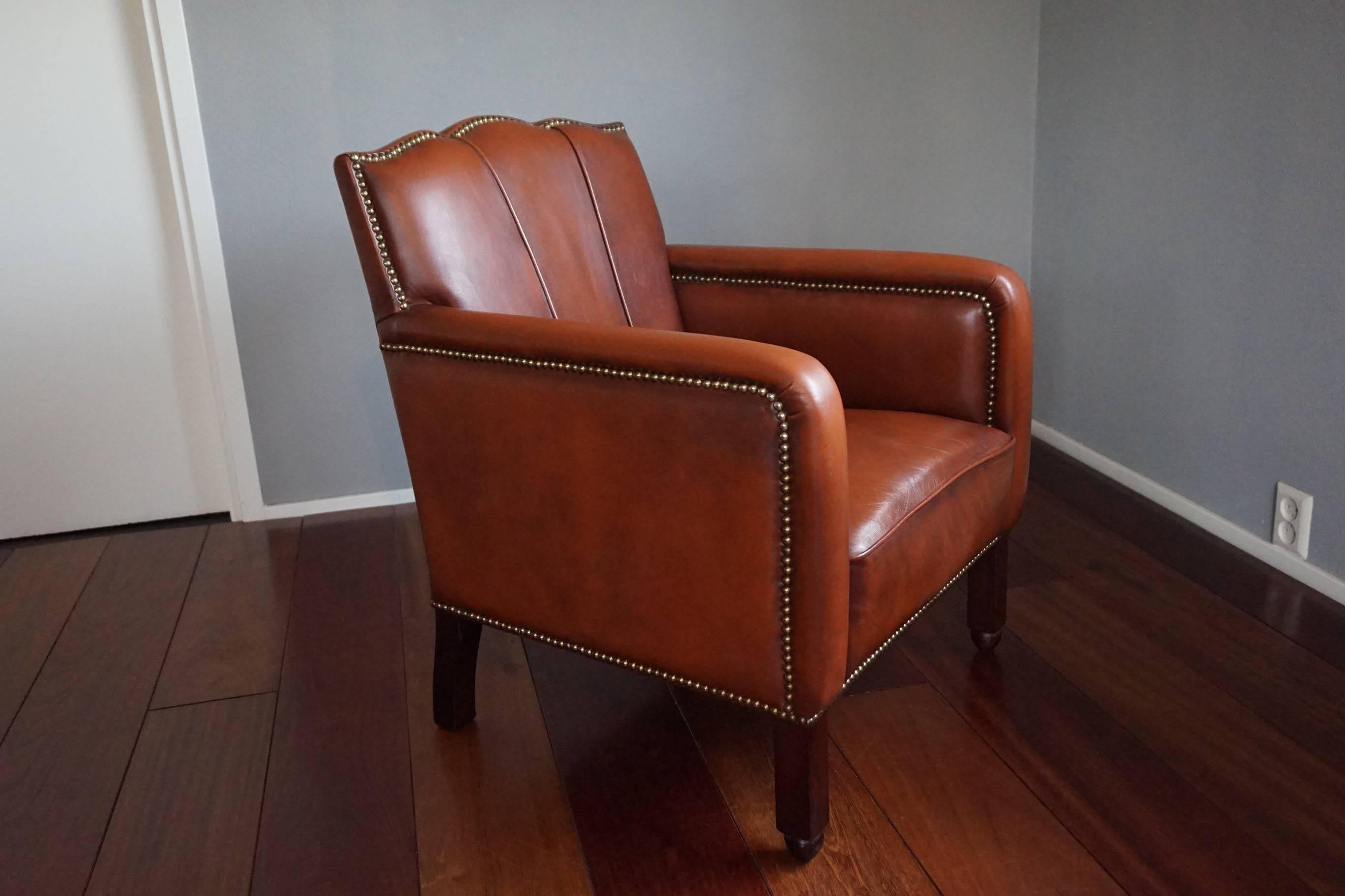 Small size Art Deco ladies chair.

This rare model and rare size Art Deco ladies chair has the most beautiful lines. These wonderful lines are accentuated by the stylish, brass furniture nails and the combination makes this chair very pleasing to
