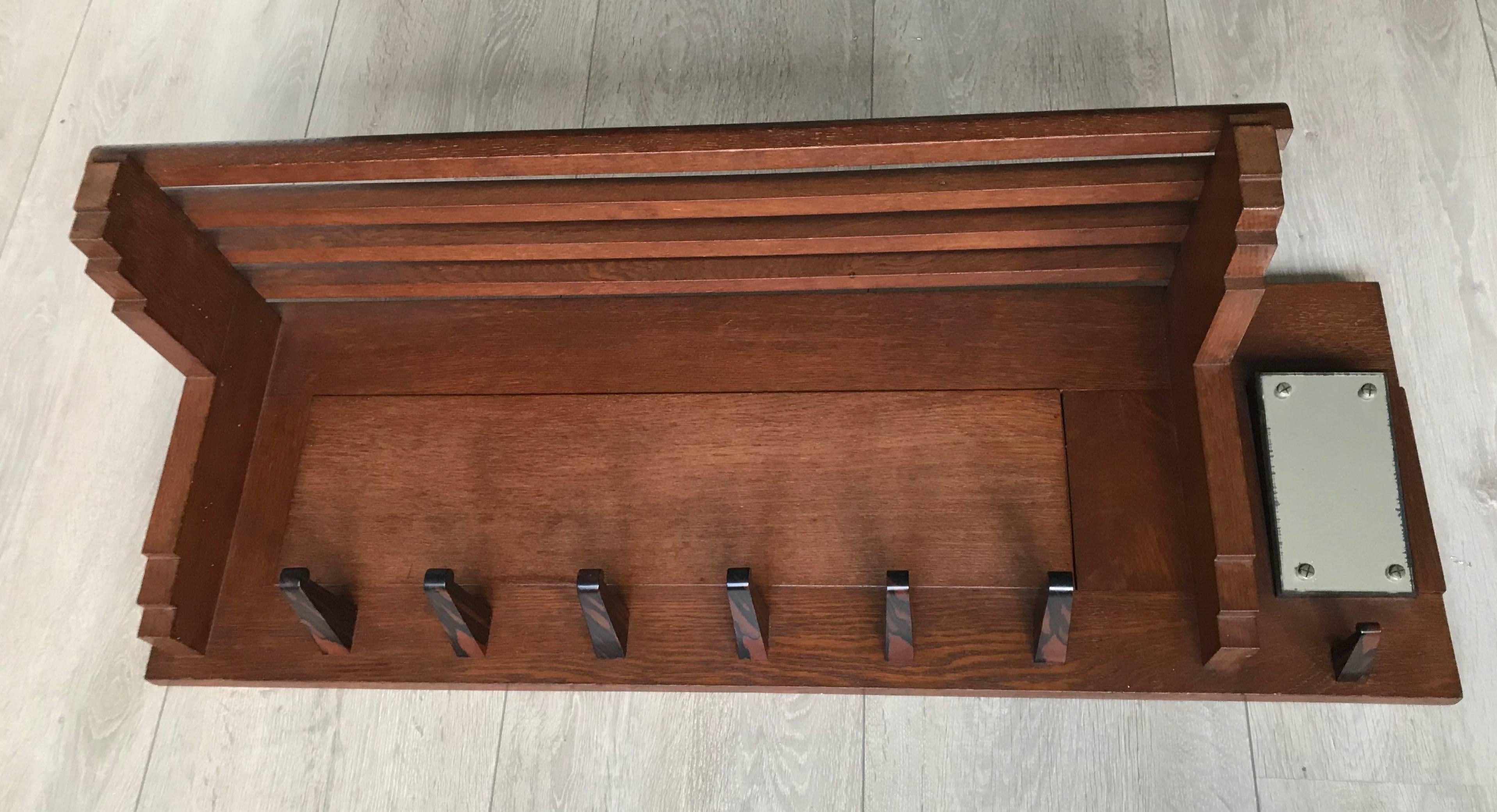 Top-quality Arts & Crafts coat rack, early 1900

This rare coat rack is entirely original and if you are looking for a top quality and highly practical one to grace your hallway / entrance then this fine specimen could be perfect for you. The