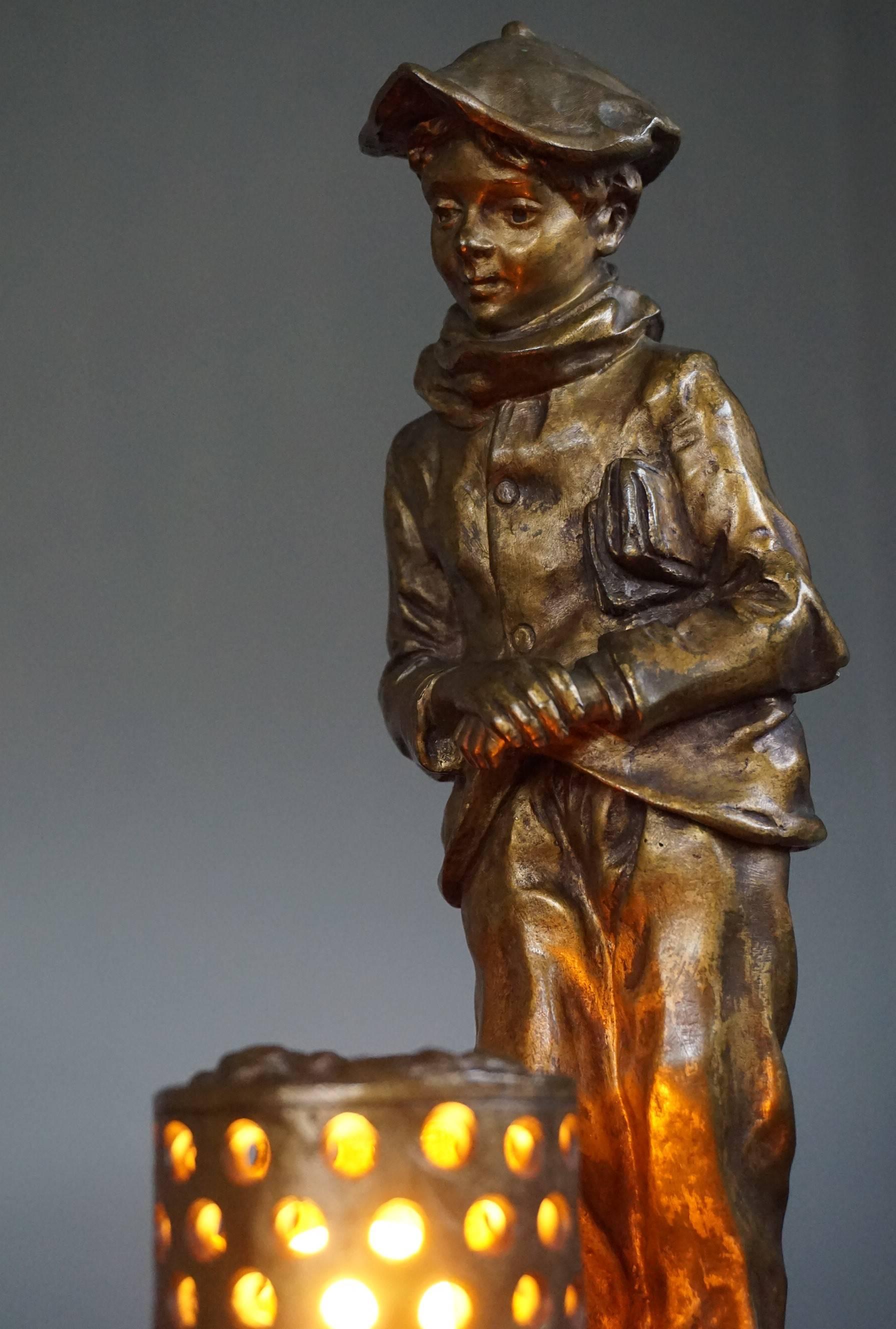 Hand-Carved Antique and Signed Gilt Bronze Boy with Newspaper by the Fire Table or Desk Lamp