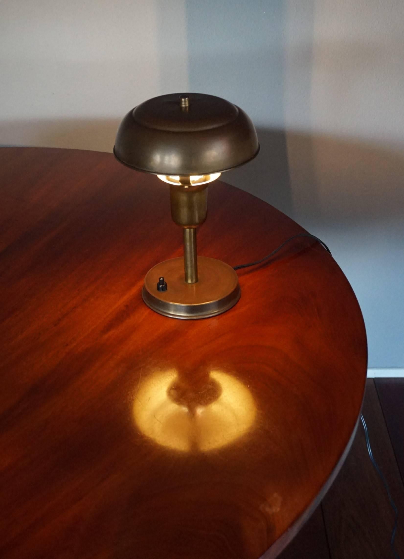 Practical size table lamp with a wonderful look and feel.

There is something about table lamps from the past that you just don't find in modern lamps. If you don't have the right eye than this particular Art Deco lamp might look 'simple'. However,