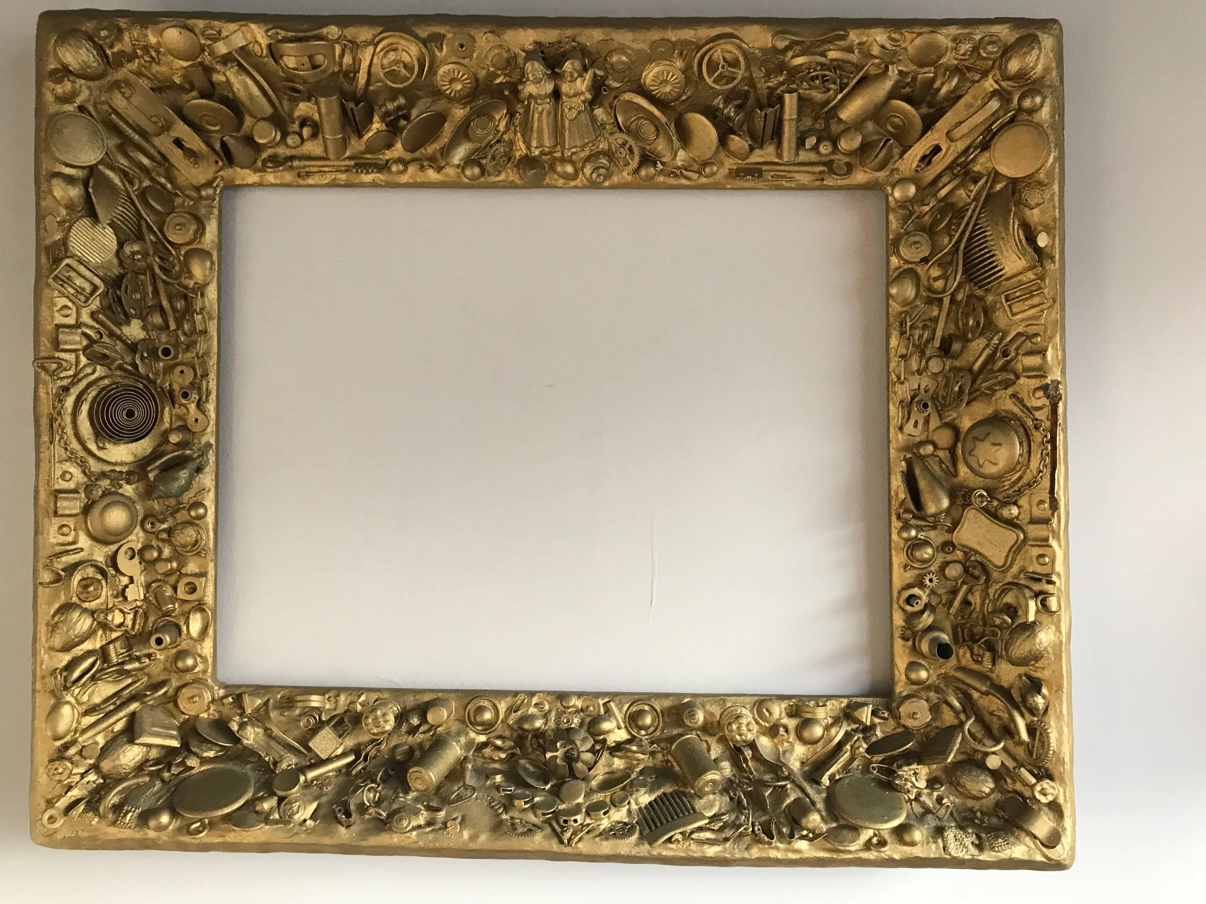 One of a kind artwork picture or mirror frame.

This unique work of wall-art never seizes to draw your attention. Everytime you look at it, you will discover something new, because there is so much going on. The beauty and originality in this modern