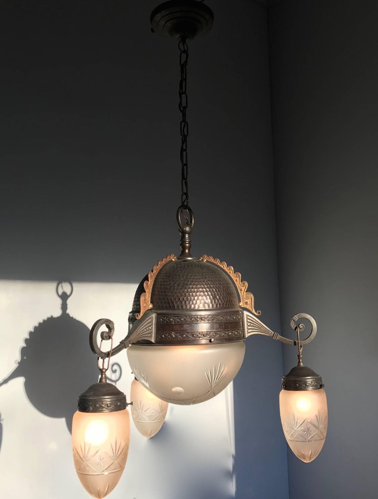 Stylish design, hand-crafted, early 1900's light fixture.   

If you have a home or an office that dates from the early 1900's or if you are a collector of stylish and out of the ordinary, Arts and Crafts home accessories then you will love the look