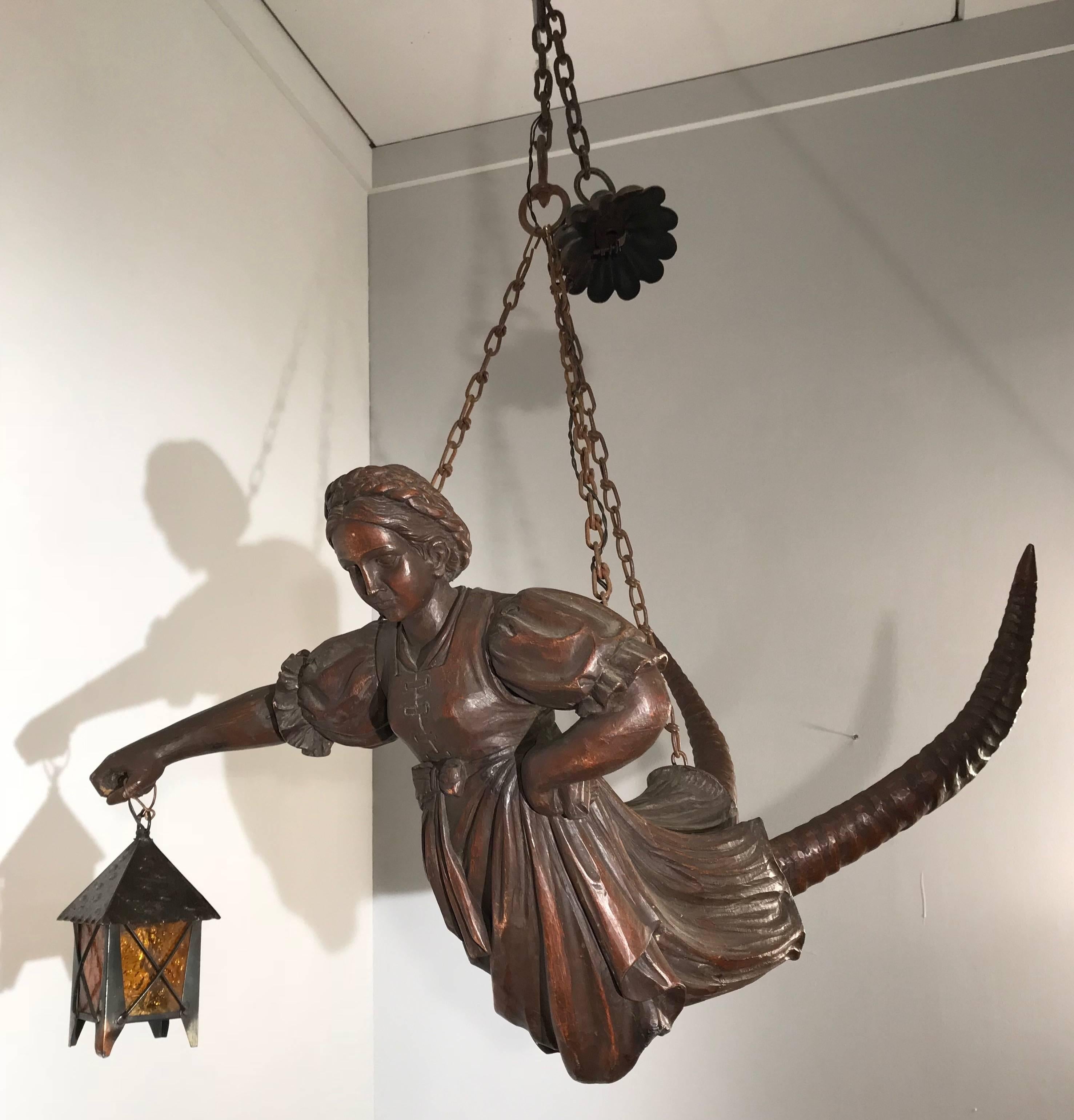 Rare 'female chandelier' with hand-carved ibex horns.

For collectors of Black Forest antiques and for collectors of rare and well-crafted, decorative light fixtures, we also have this striking Lusterweibchen pendant. This type of light fixture was