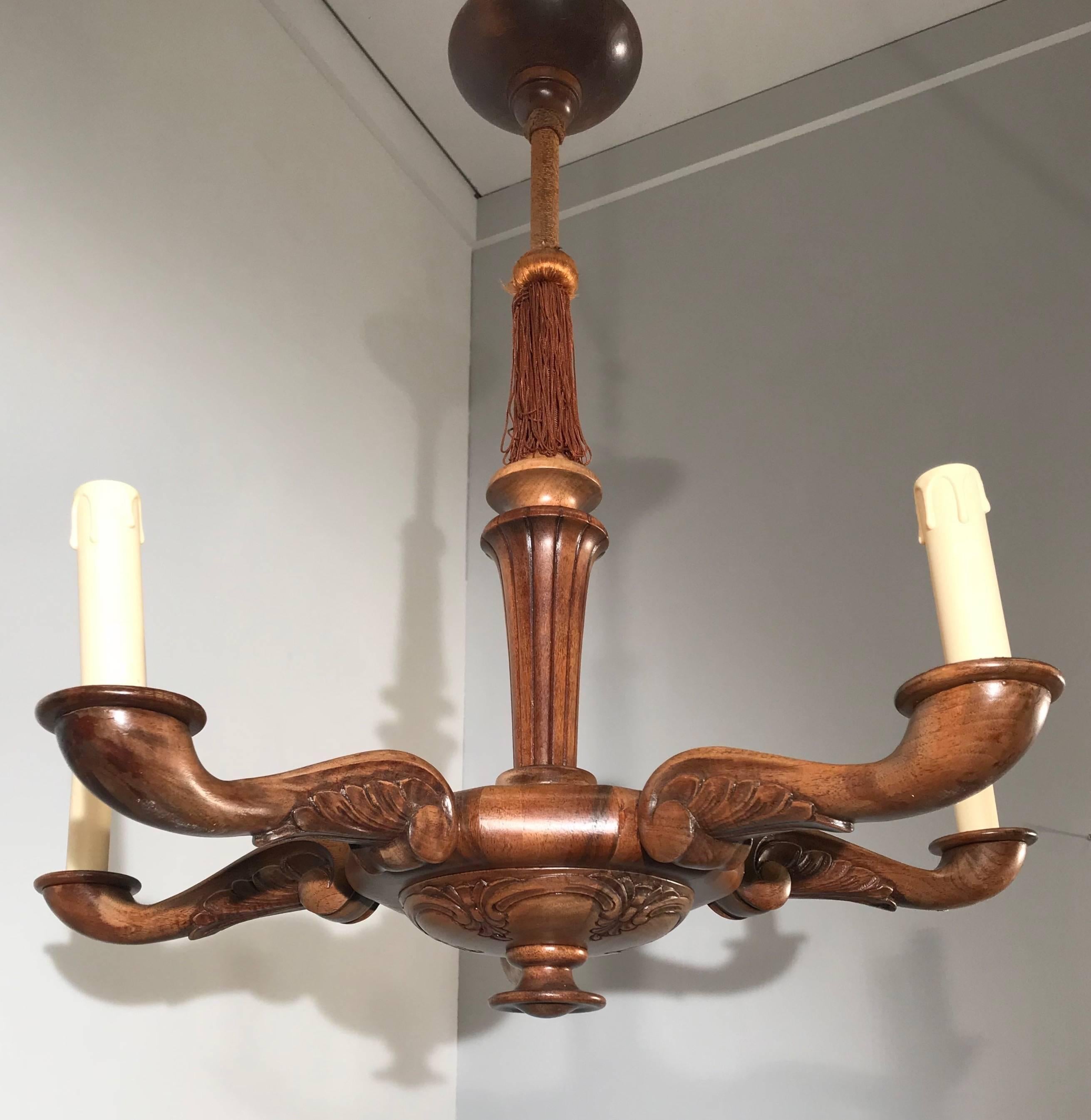 Stylish and all handcrafted chandelier from the turn of the century.  

This good quality and practical size, hundred years old pendant has five perfectly and evenly carved arms. This turn of the century workmanship pendant is made of beautiful