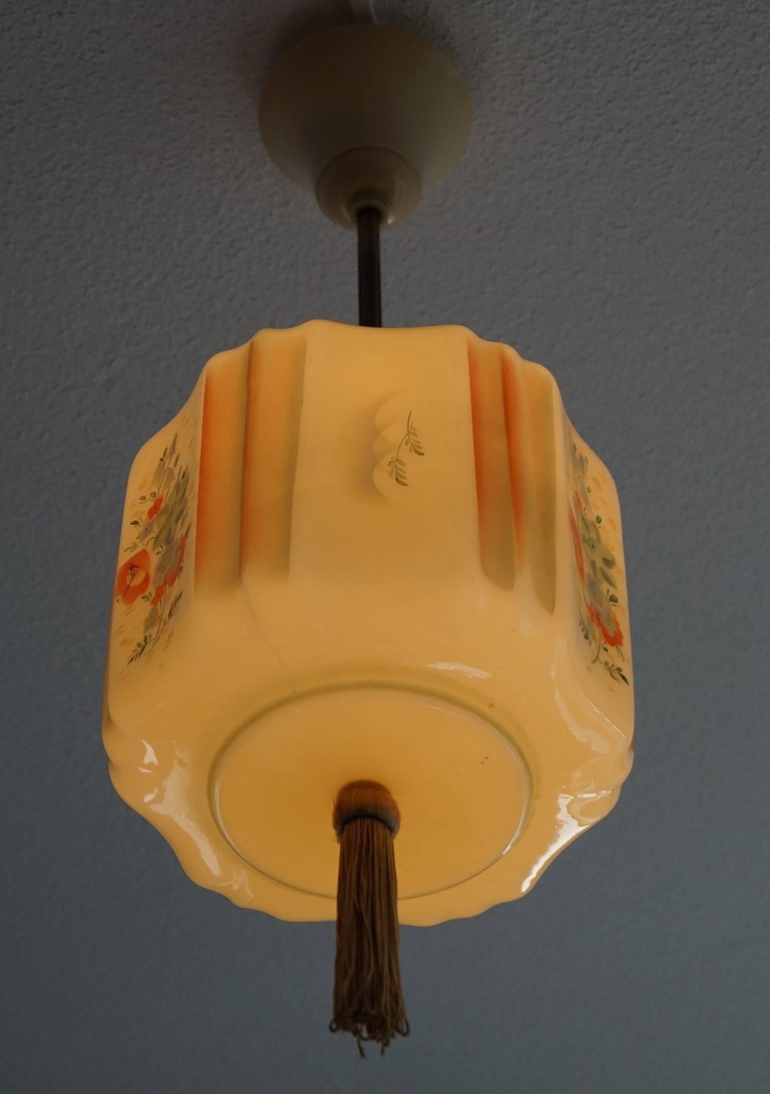 Handcrafted and rare, Asian lantern-like pendant.

This rare combination-of-styles pendant too is in excellent condition and a joy to own and look at. It actually comes from the same home as the Asian American Style pendant we sold via 1stdibs last